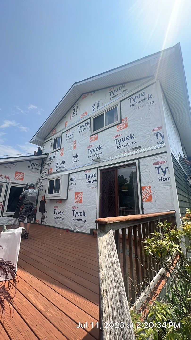 Siding Installation using CertainTeed Cedar Impressions by Bloomfield Construction & Restoration