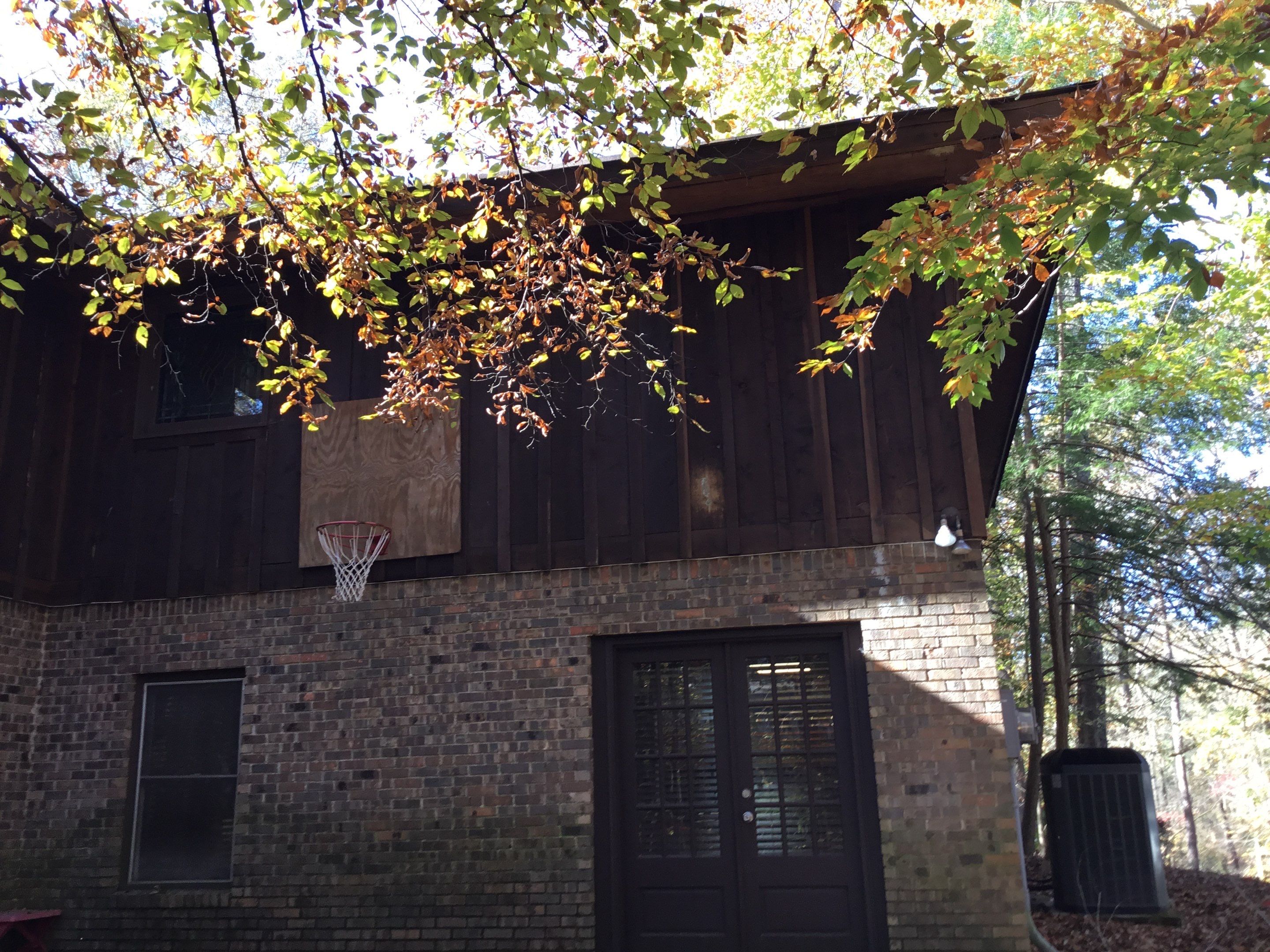 Exterior Wood Siding Painting and Gutter Refurbishment in Roswell by Swift Home Renovations