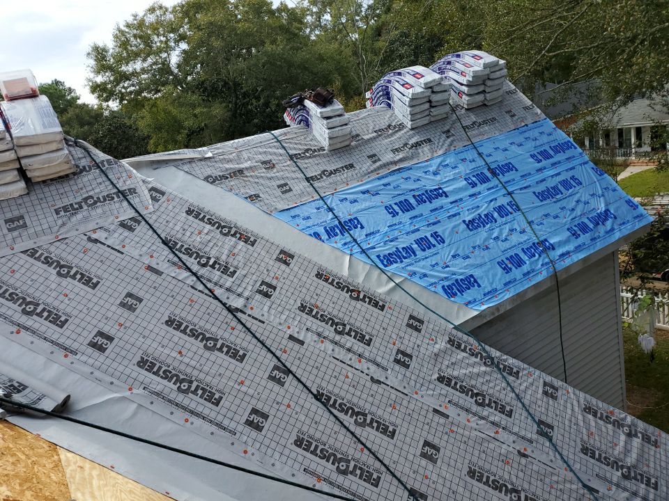 Residential Roofing Installation using Roof Replacement by American Roofing & Construction LLC