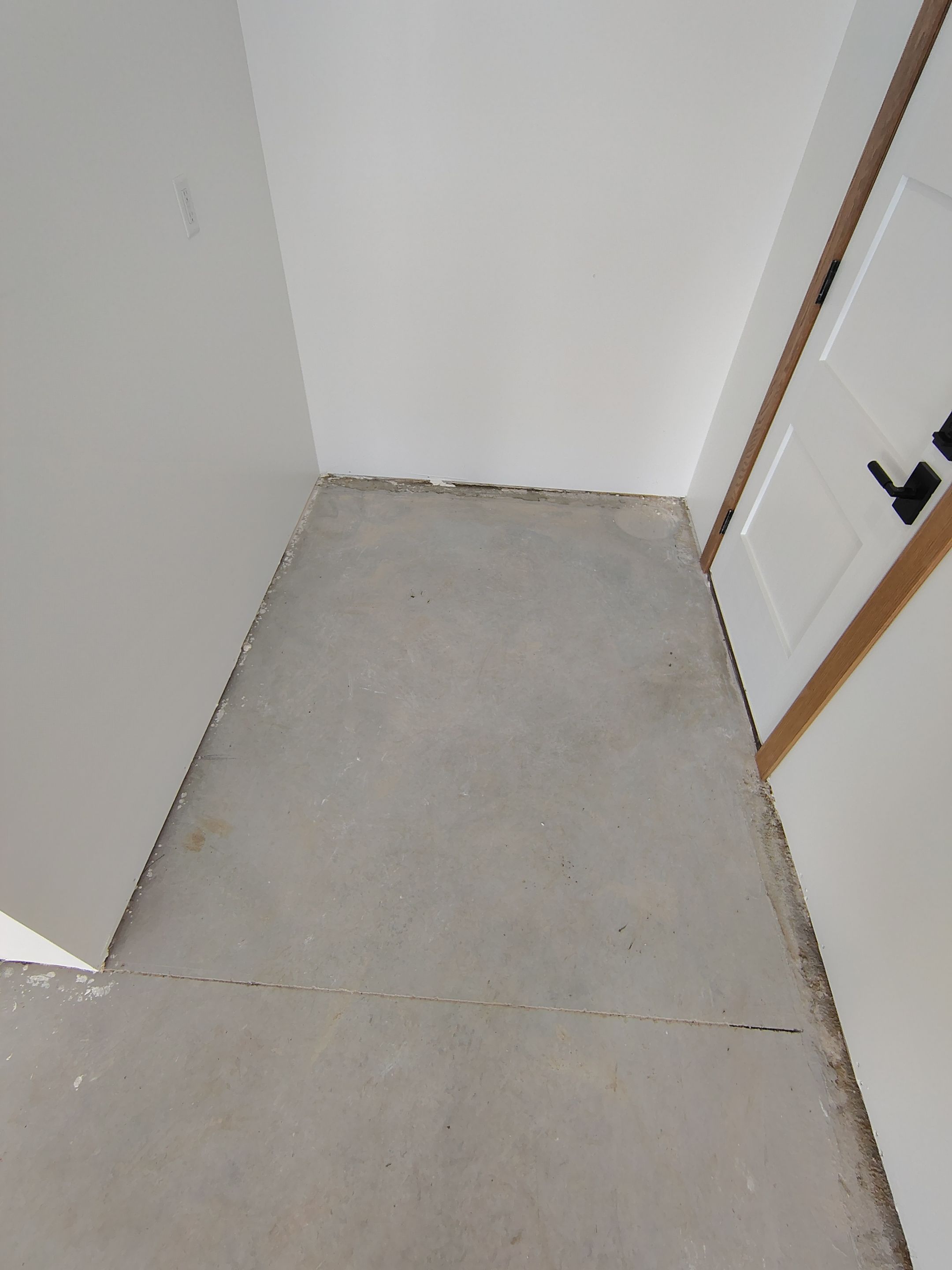 Gray and White Speckled Epoxy Garage Floor Coating in Tea by Select Painting, Coatings & Garage Cabinets