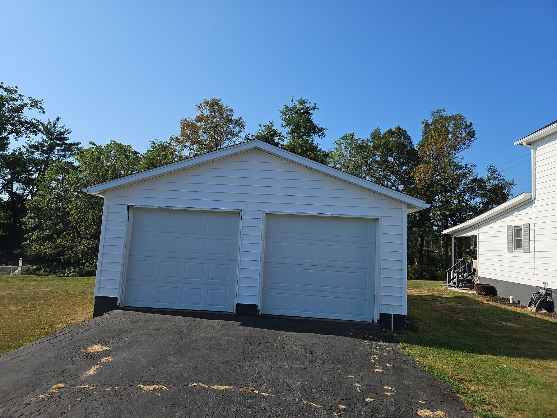 Roseville, Ohio Shingle Roof and Siding Installation by Pine Ridge Roofing LLC