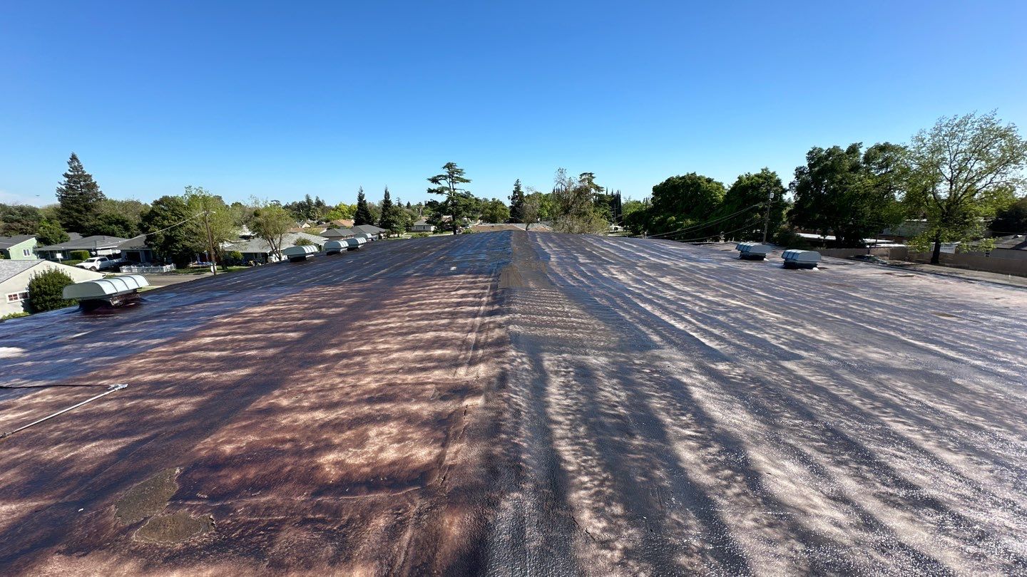 Foam Refurbish using Conklin Benchmark/PUMA XL coatings and spray foam by Straight Edge Roofing Inc