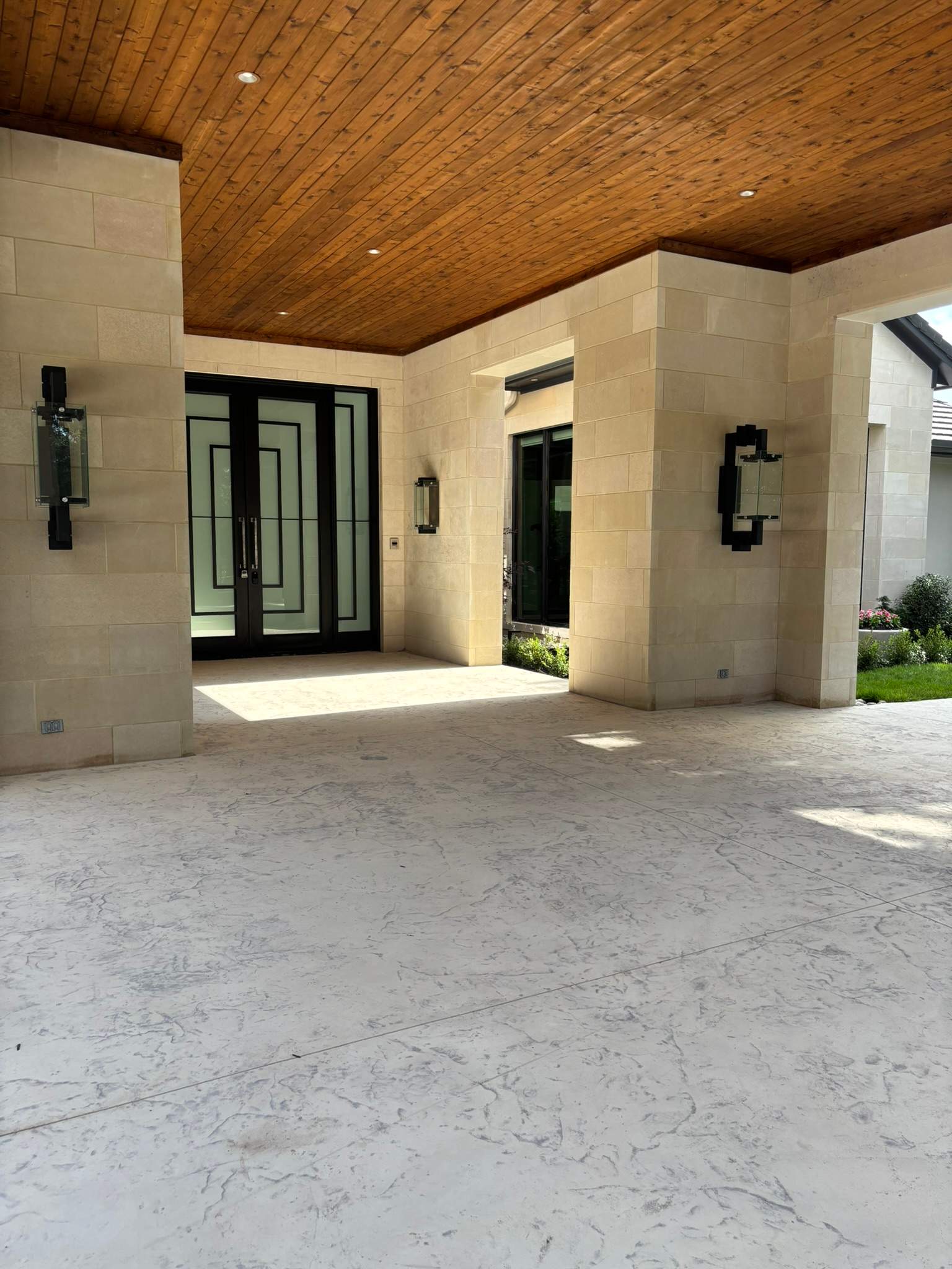 Modern Metal and Glass Entryway Installation with Custom Hardware Finishing in Dallas by Solara Custom Living