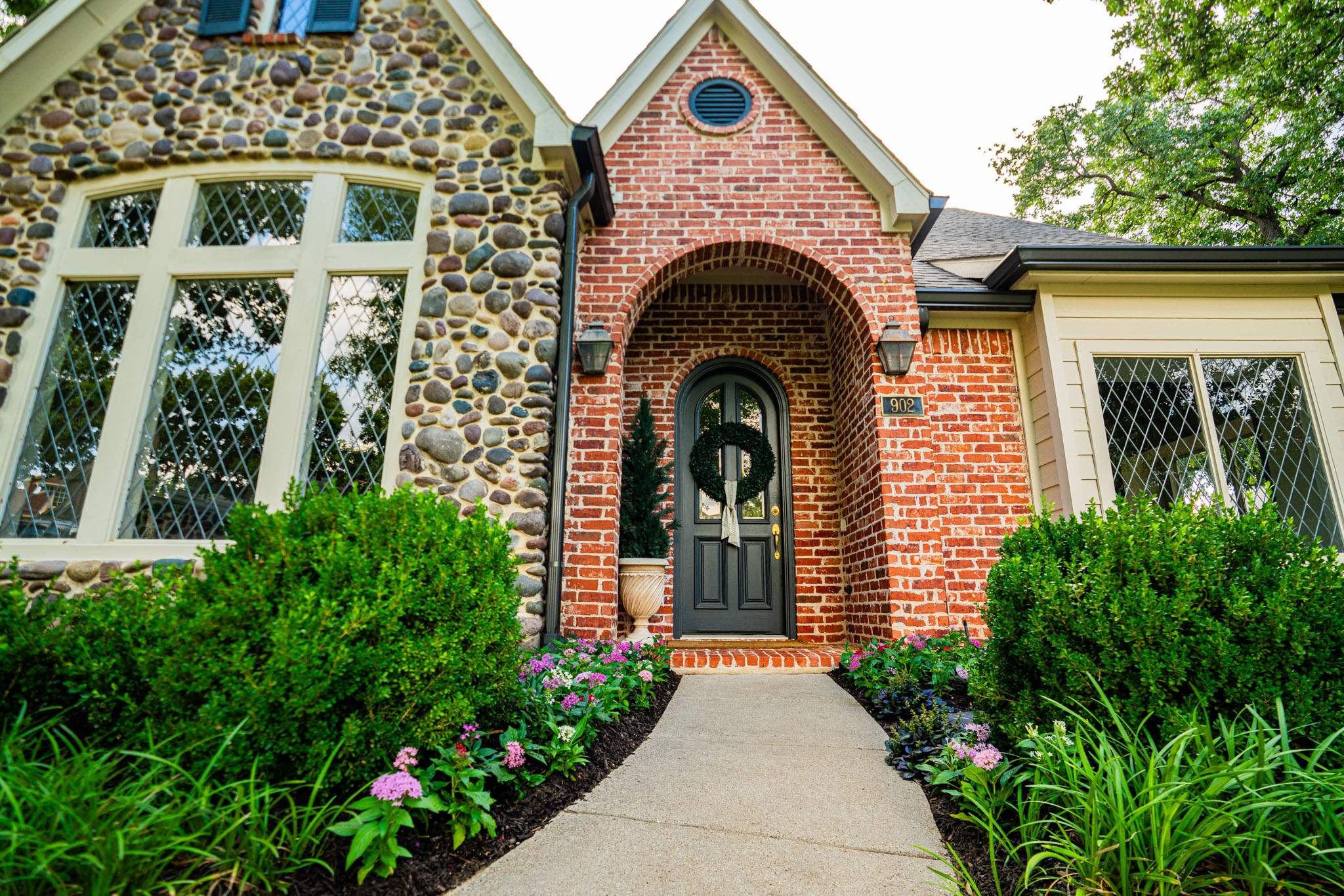 Southern Charm: Revitalizing a Cottage Garden by Complete Exterior Solutions