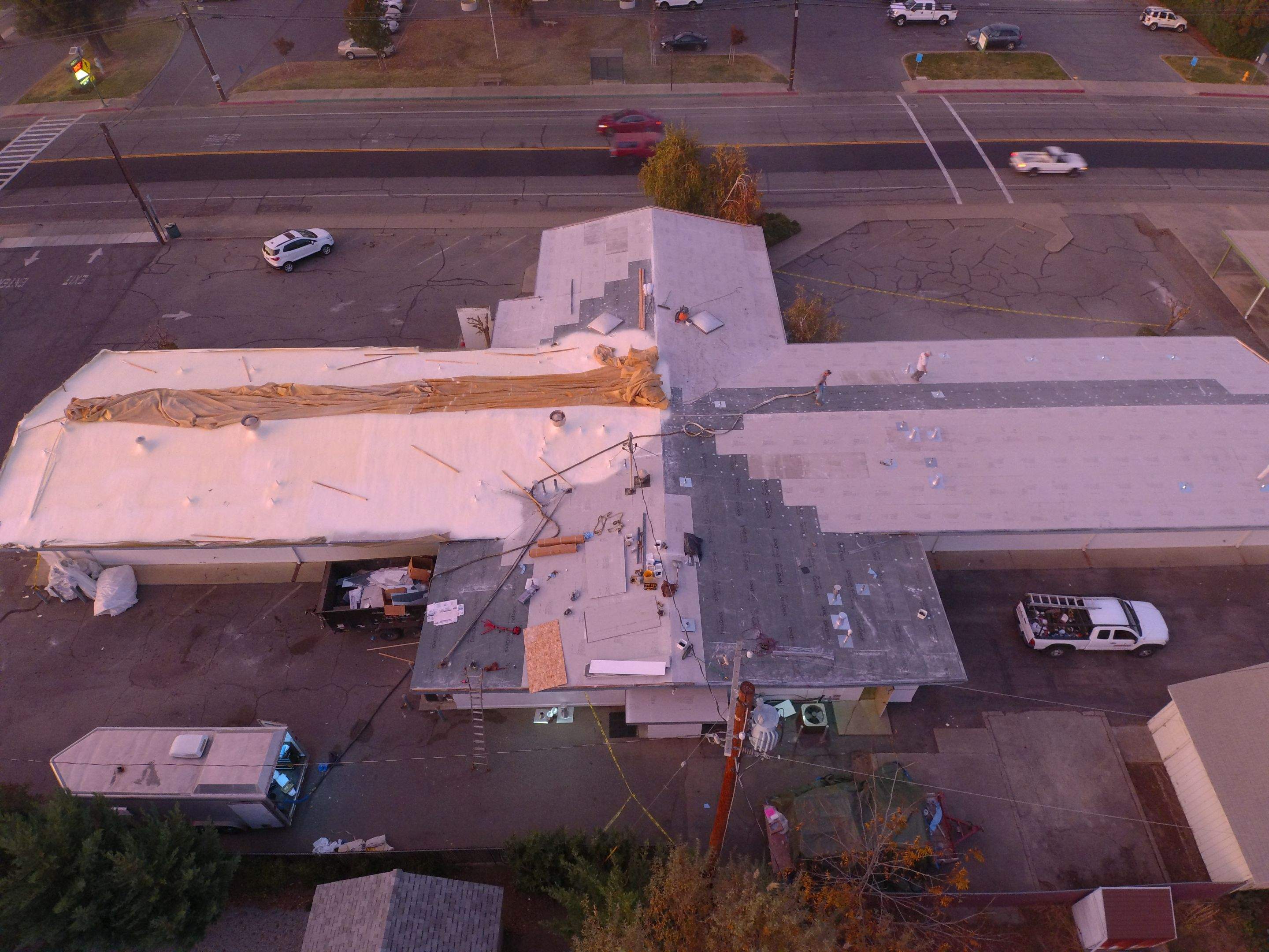 Spray foam and coatings using Conklin Benchmark/PUMA XL coatings and spray foam by Straight Edge Roofing Inc