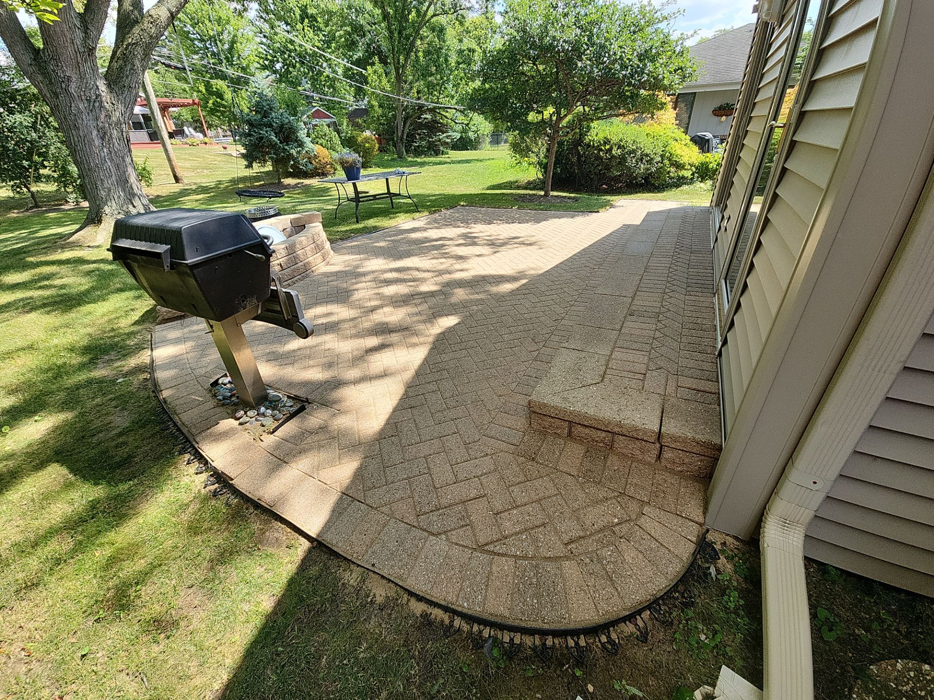 Arlington Heights Brick paver repair, cleaning and sealing by Northern Power Washing LLC.