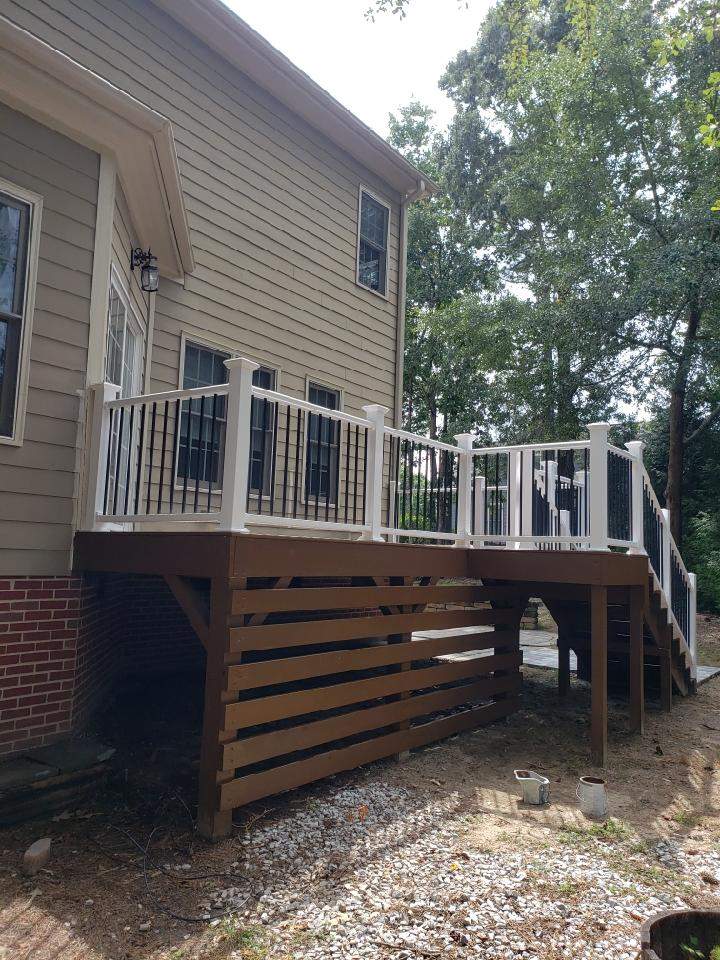 Fuquay-Varina Outdoor Upgrade – Composite Deck & Paved Landing by Elite Remodeling and Design LLC