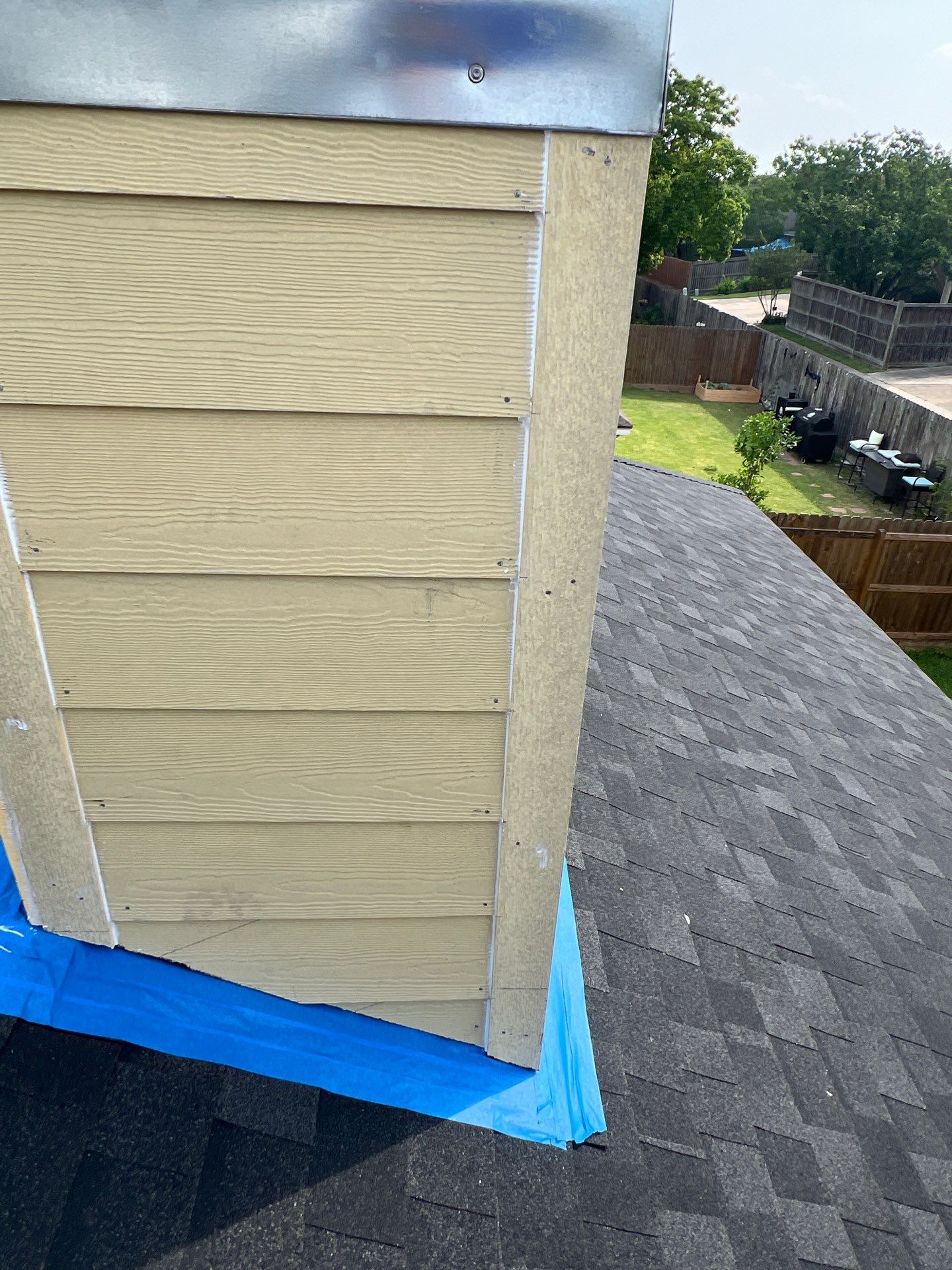 Nothing looks nicer than a little black roof by Bayfront Roofing and Construction