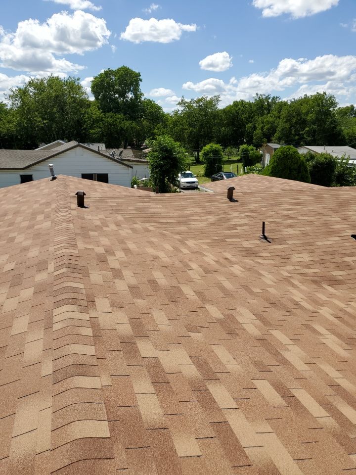 Residential Roofing Installation using Roofing Shingles by Harvey Roofing & Construction