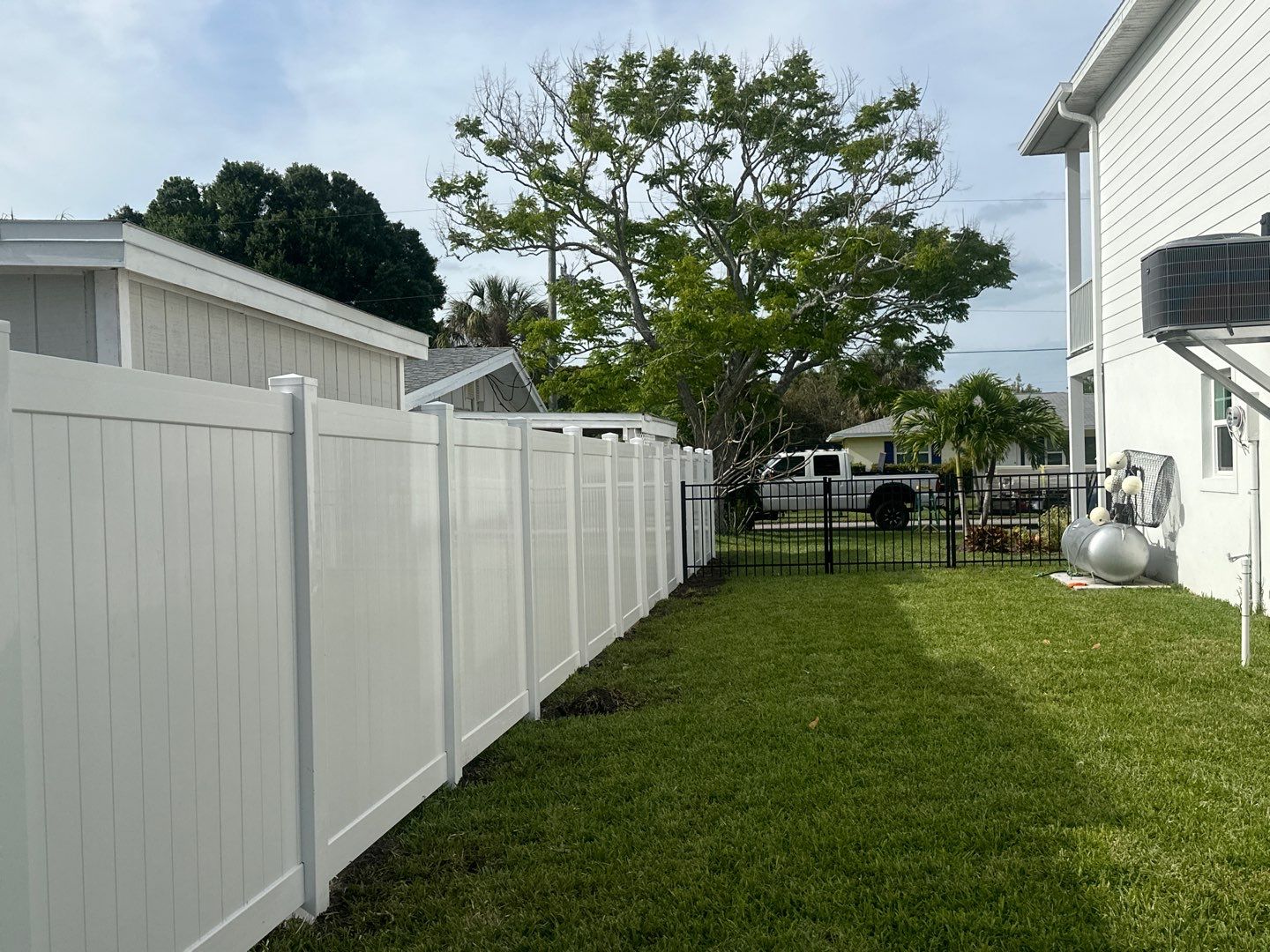 Aluminum Fence Installation using Black 3 Rail Aluminum and Vinyl Privacy Fence  by Asap fence and gates, LLC
