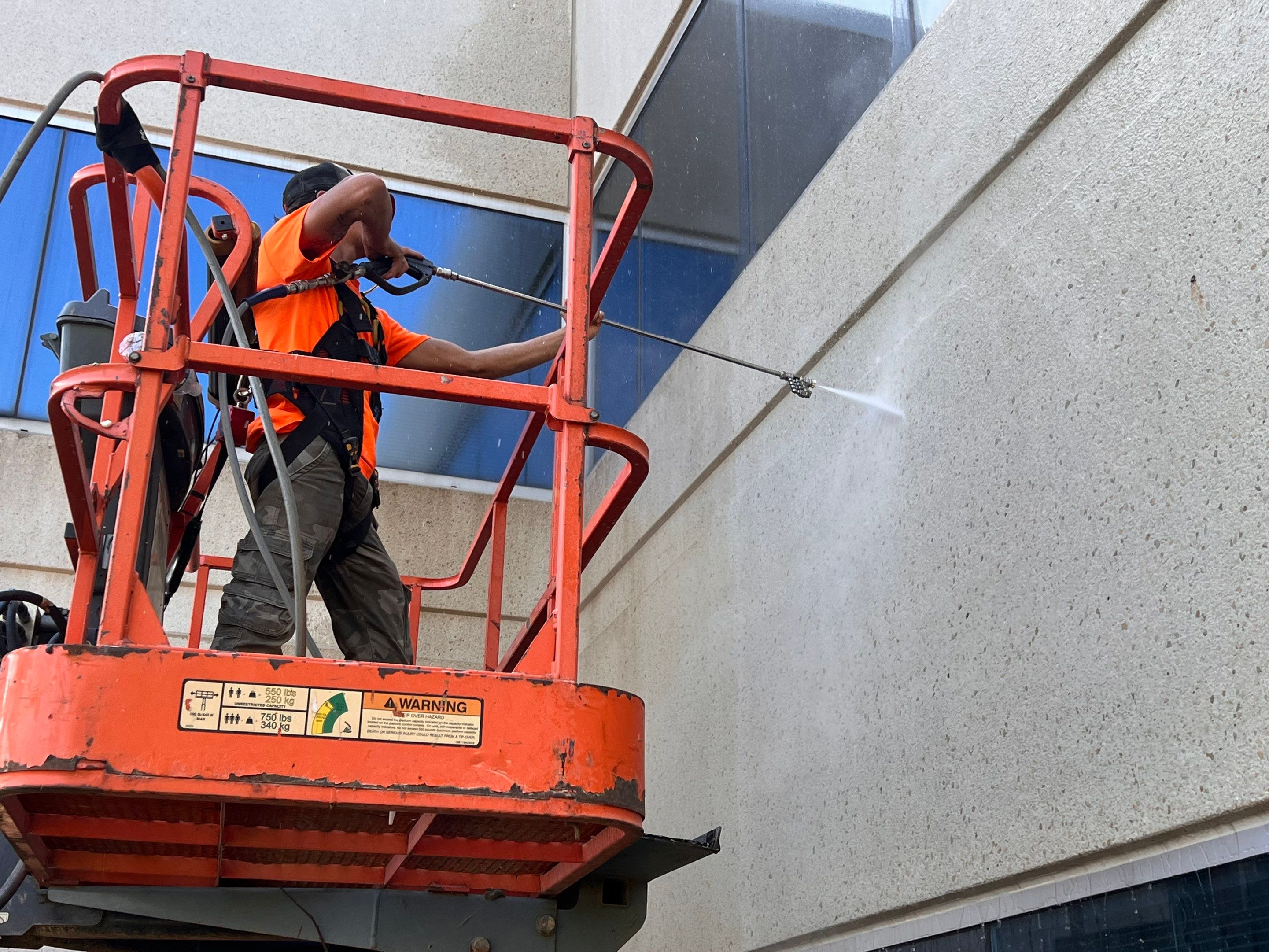 commercial pressure washing using Algaecide, soft wash soap by Northern Power Washing LLC.