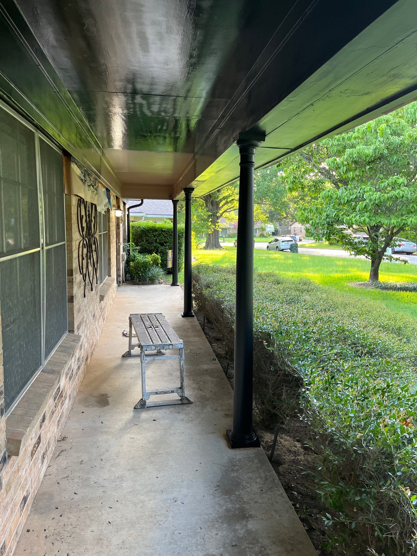 Exterior Painting in Tyler, TX | Eaves, Door & Columns in Elegant Black by Quality Coats Painting