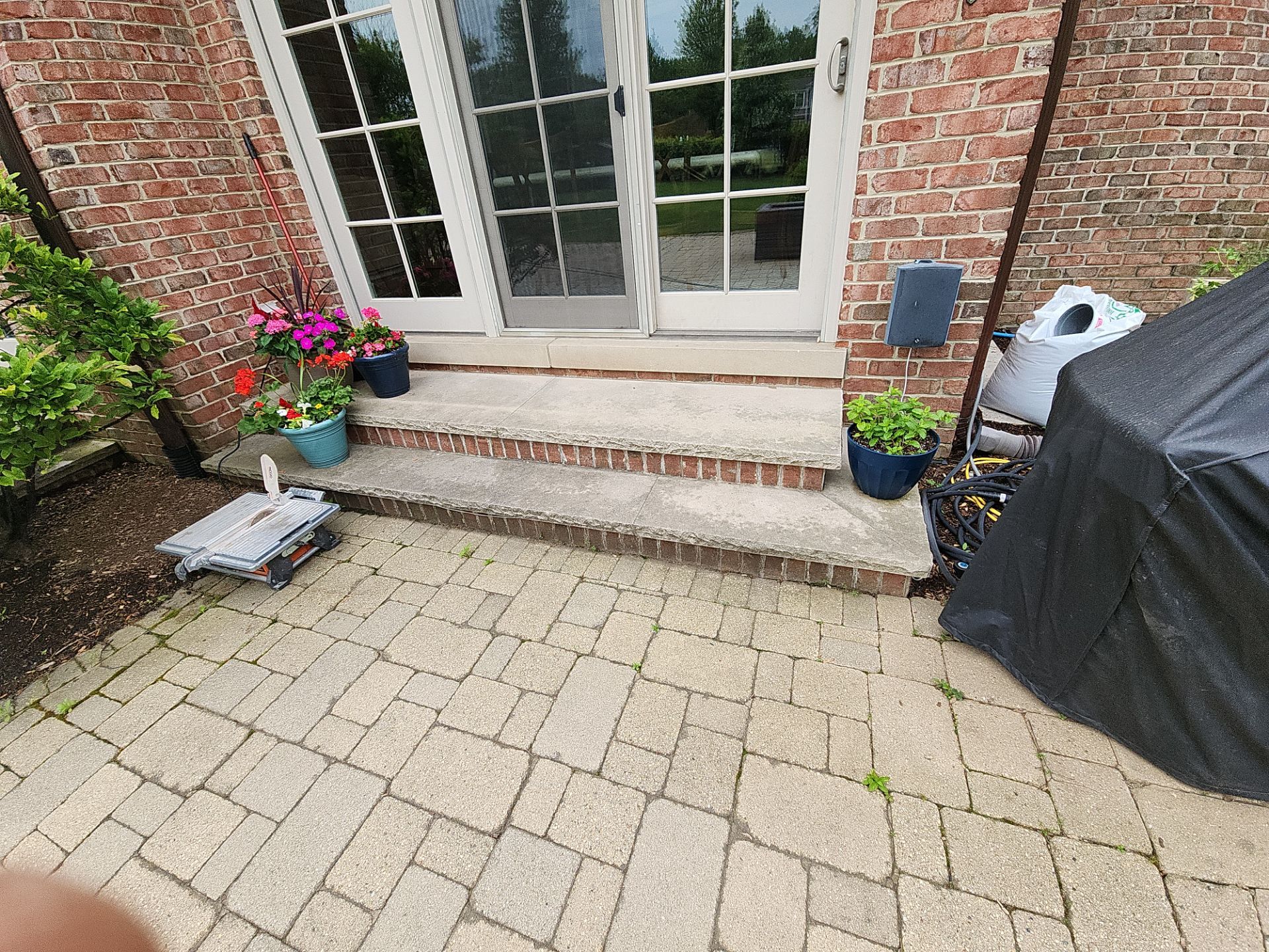 Brick paver repair, cleaning sanding and sealing by Northern Power Washing LLC.
