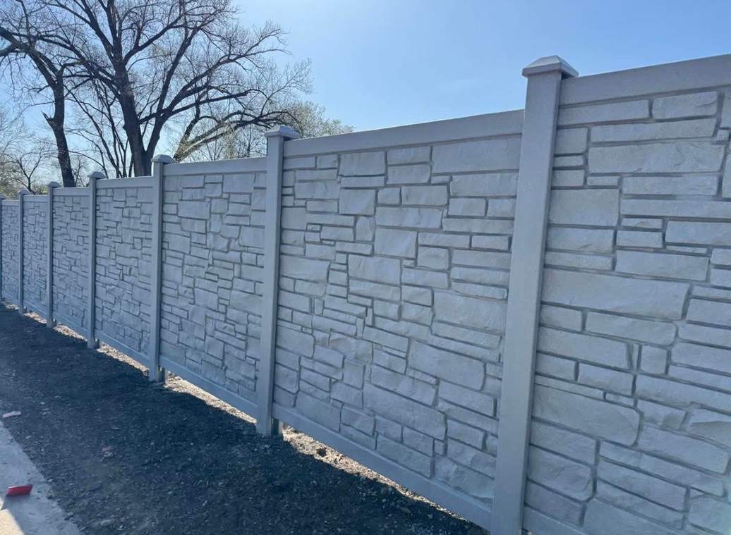 Stone Veneer Fence  by Sota landscaping