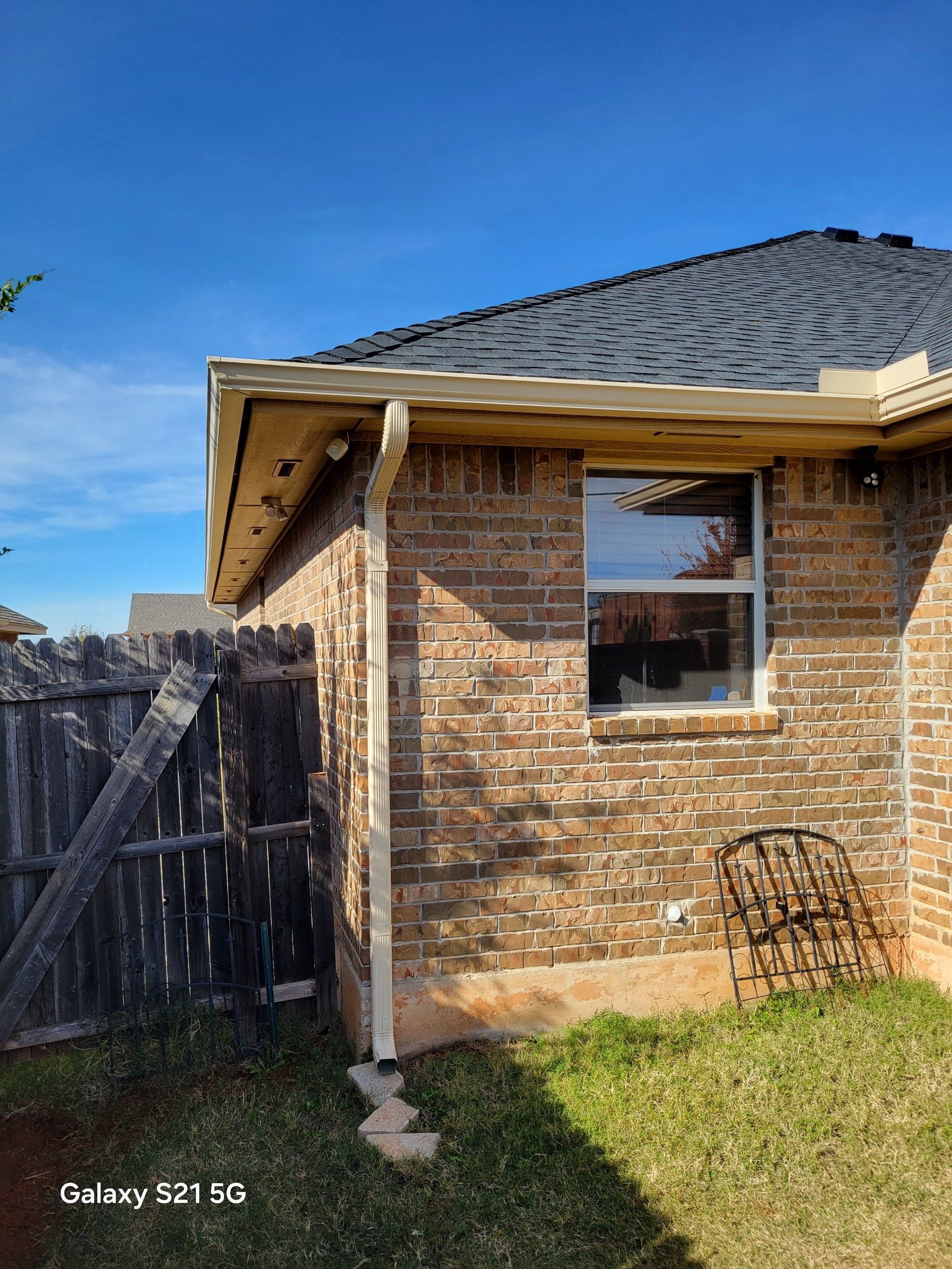 roof replacement & gutter installation in Edmond by McCann's Roofing and Construction