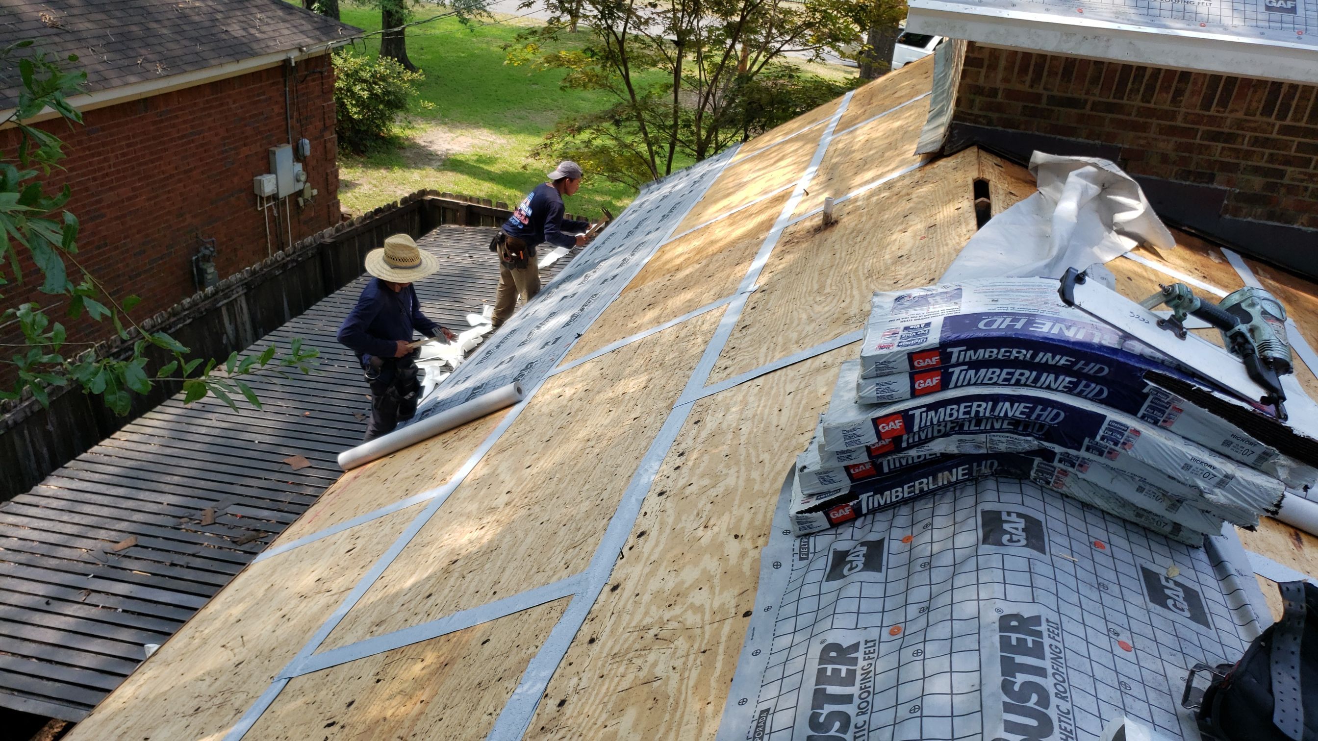 Residential Roofing Installation using Roof Replacement by American Roofing & Construction LLC