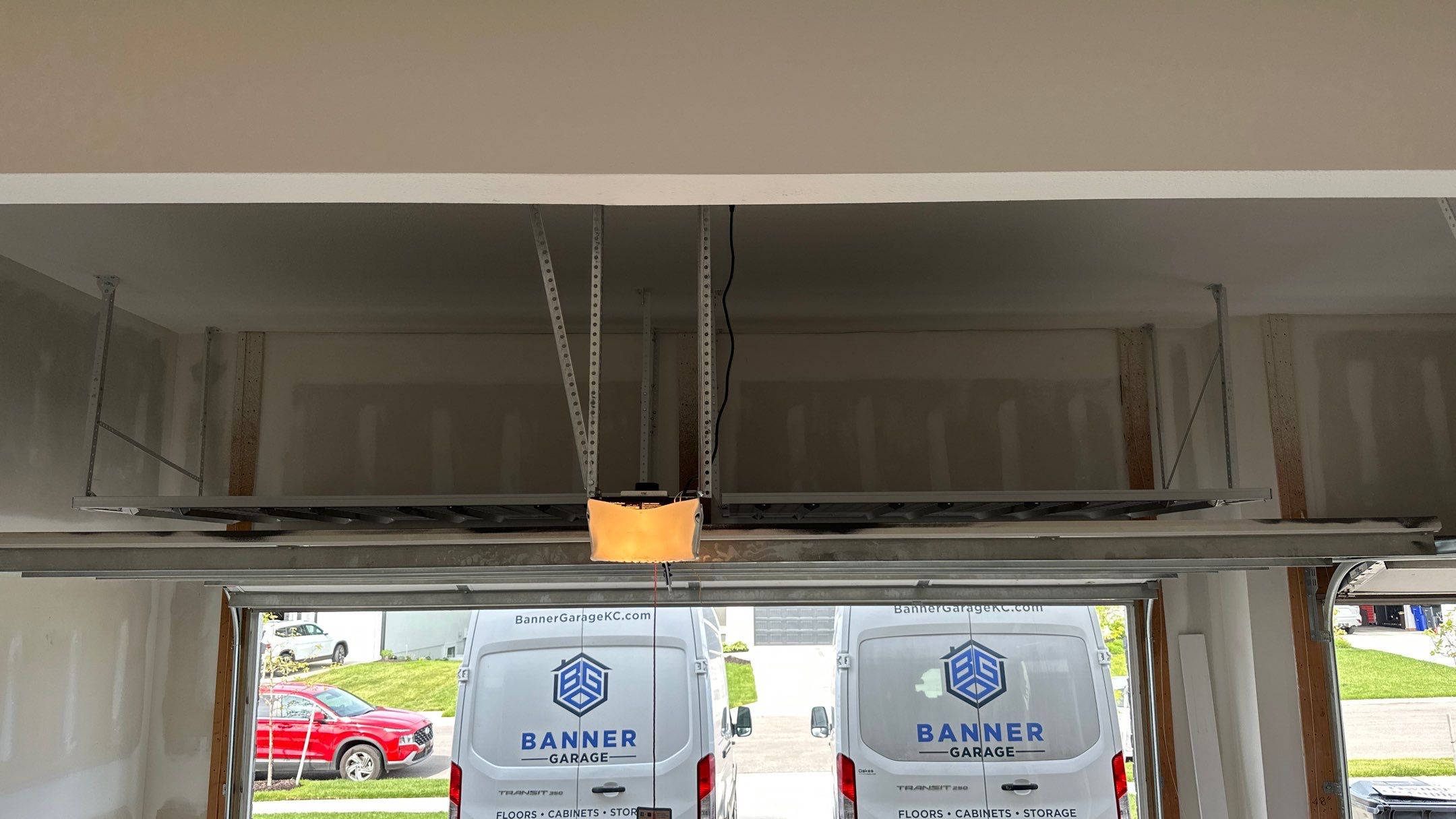 Ron B. added overhead racks to his garage  by Banner Garage