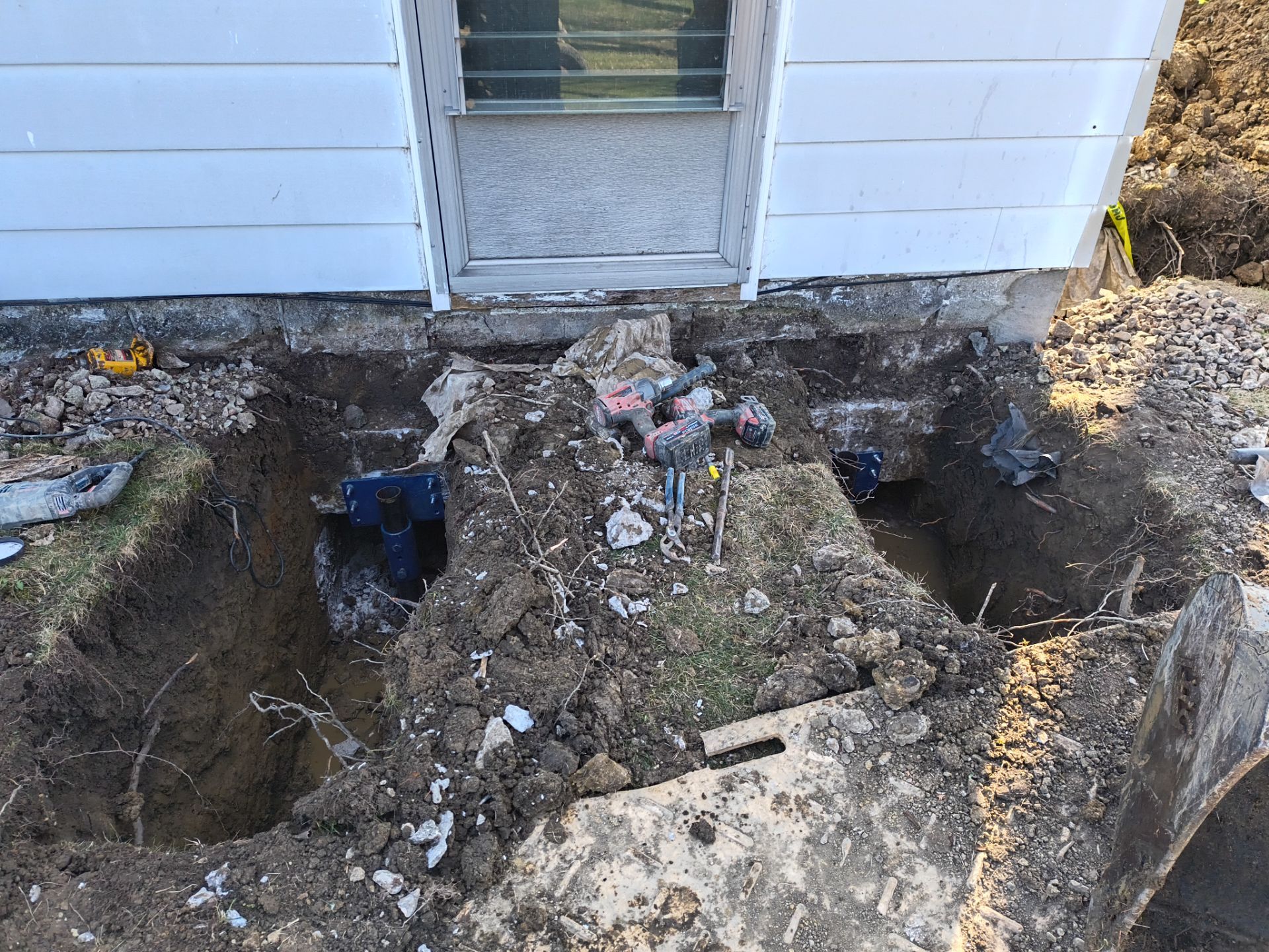 Helical Piers & Parge Coating by Toledo Basement Repair 