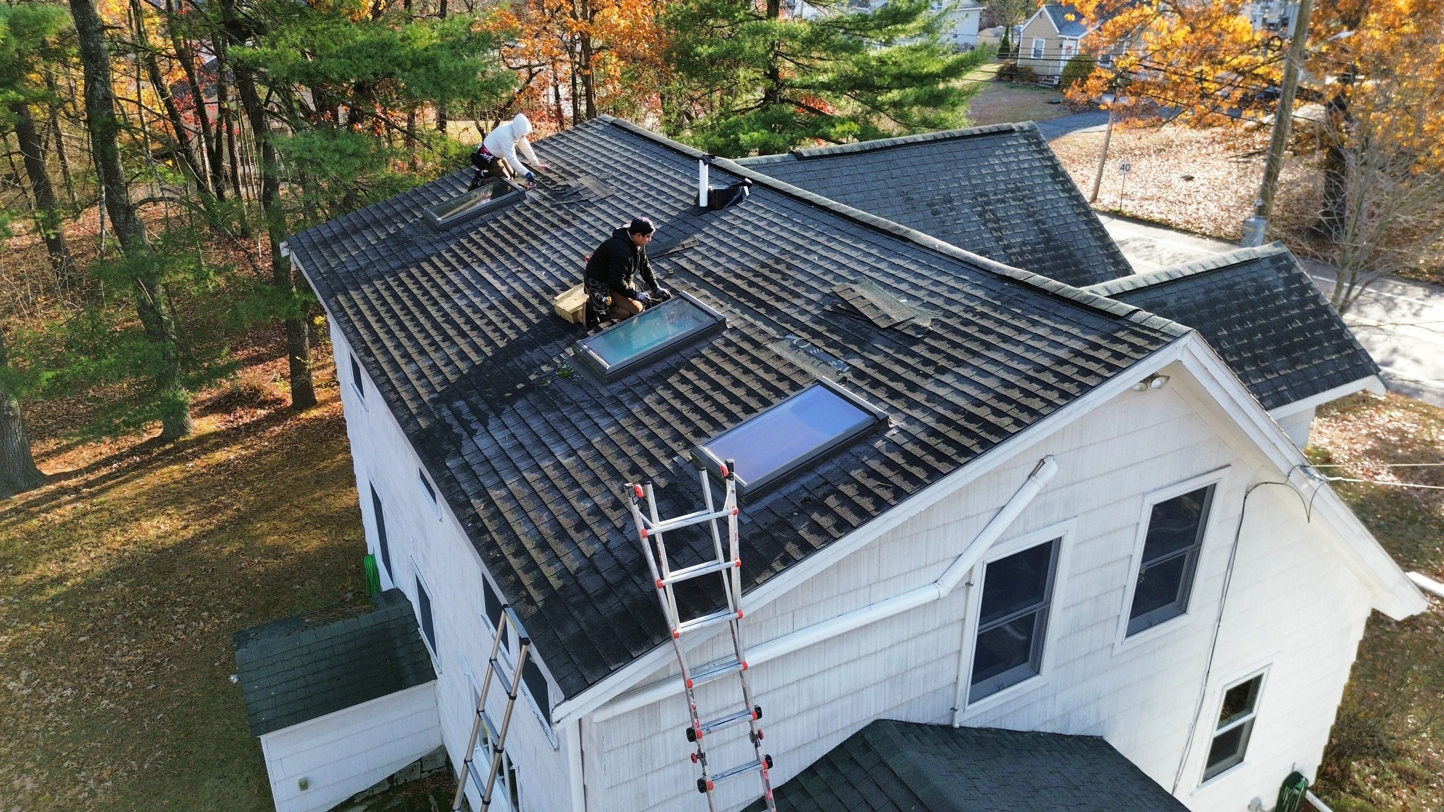 Chelmsford Triple Skylight Leak Repair with Fascia & Shingle Restoration by Mighty Dog Roofing of Greater Middlesex County