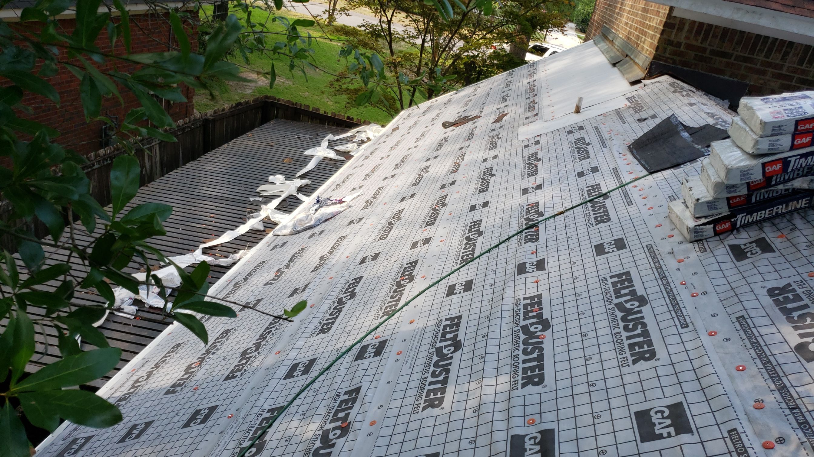 Residential Roofing Installation using Roof Replacement by American Roofing & Construction LLC