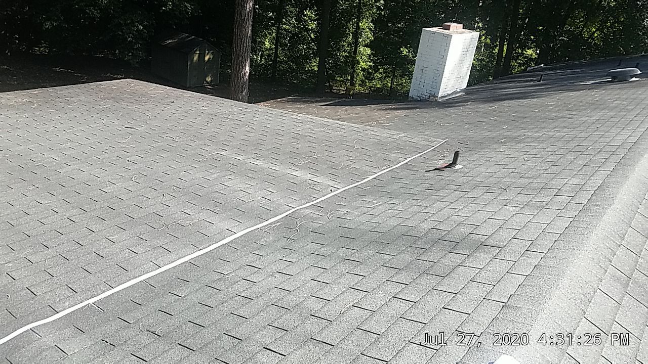 Re Roof (metal roofing) by American Roofing NC