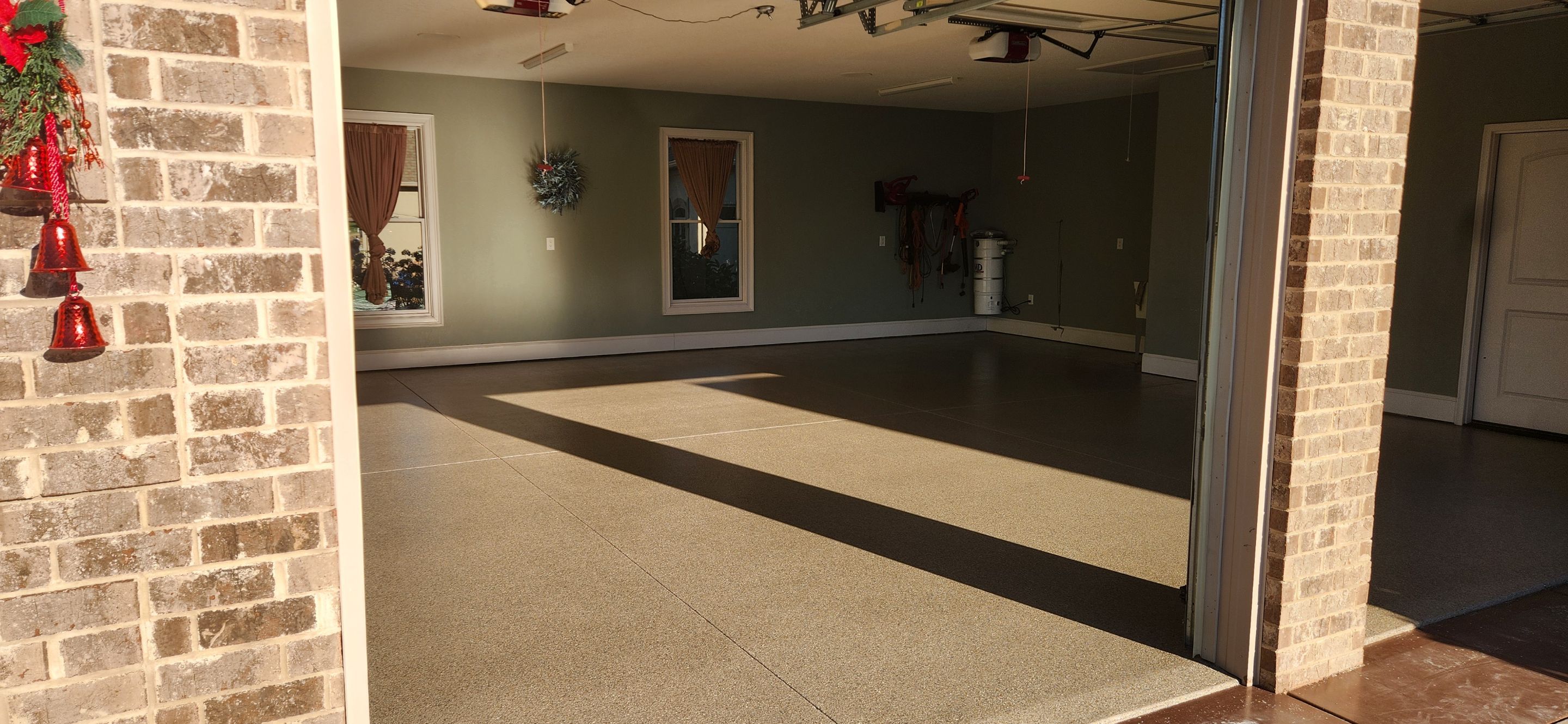 Garage & Back Patio Upgrade with Obsidian & Garnet by Elite Floor Solutions