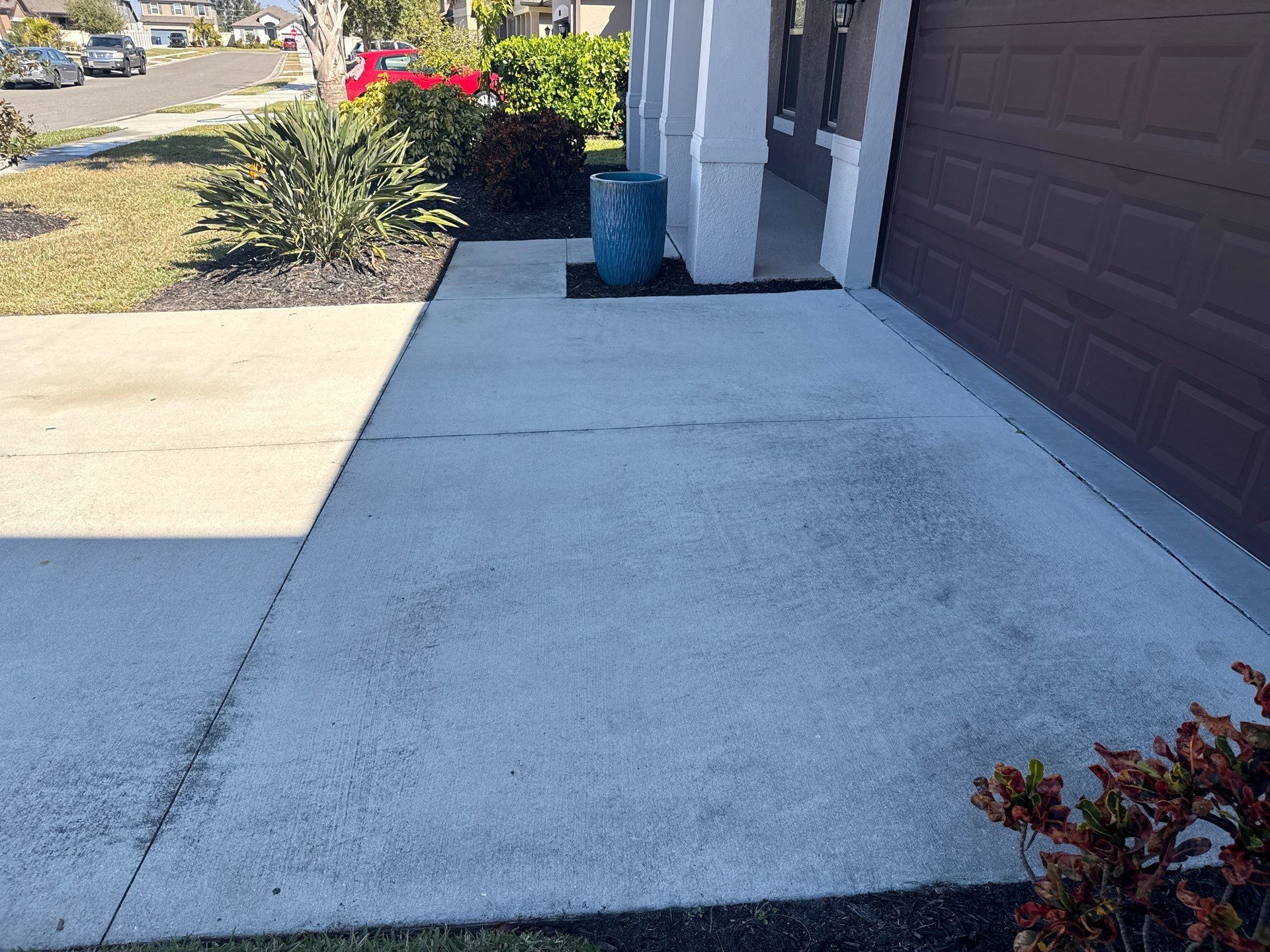 2-Car Concrete Driveway & Sidewalk Cleaning in Trevesta – Palmetto, FL by Sunshine AquaWash