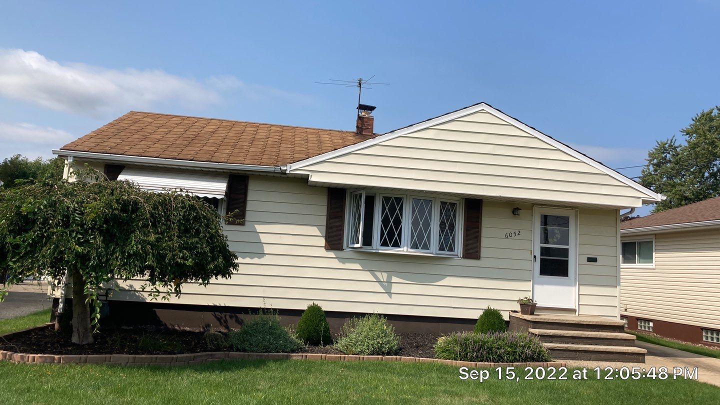 Residential Roofing Installation by Absolute Roofing and Construction