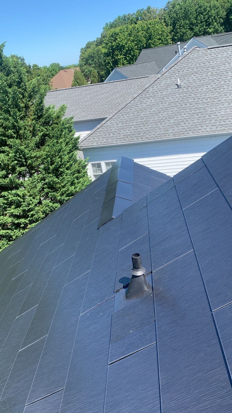 Tesla Solar Roof Replacement using Tesla Solar Roof V3 tiles by American Home Contractors