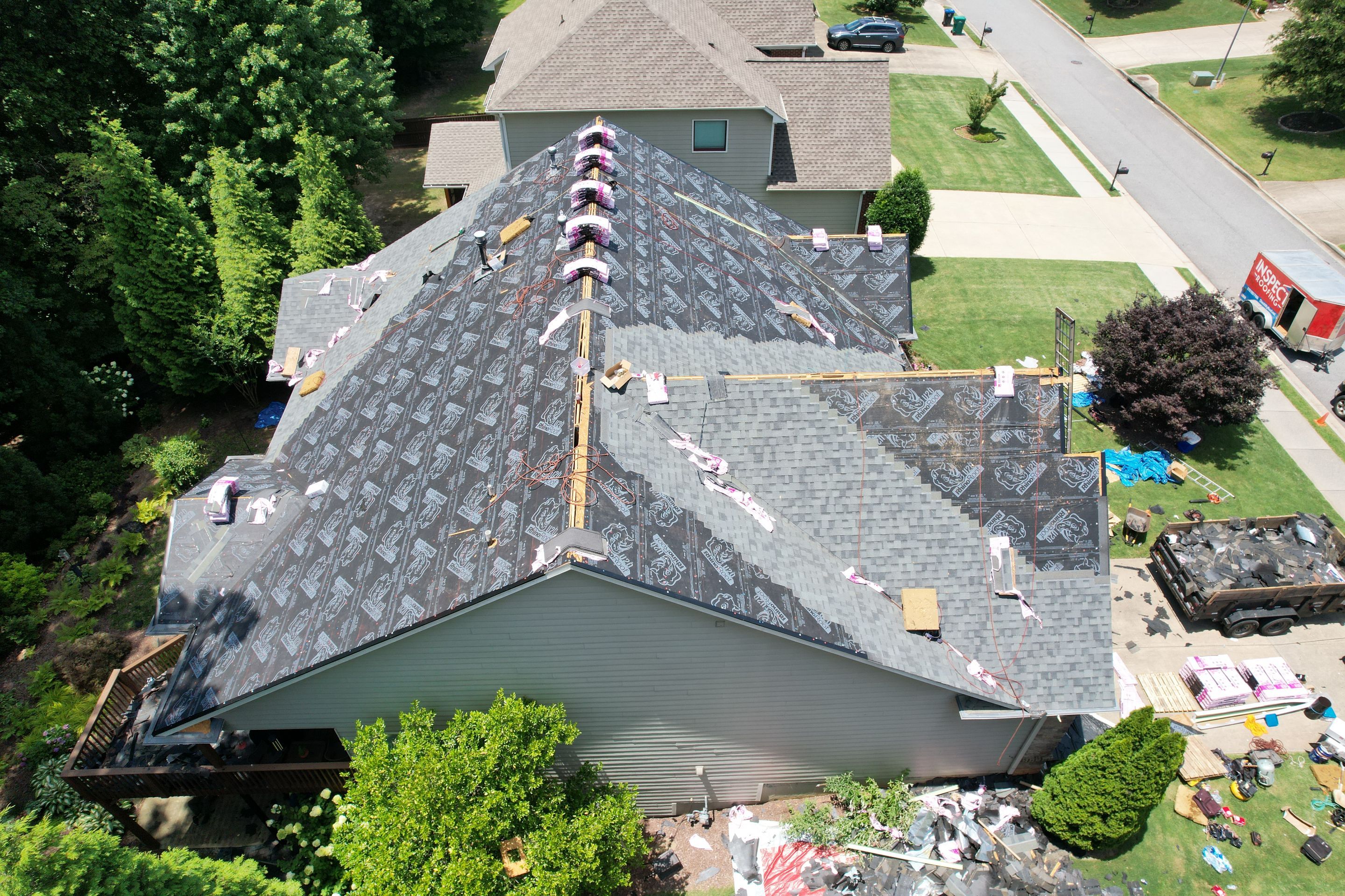 Residential Roofing Installation using Owens Corning Quary Gray by Inspector Roofing and Restoration