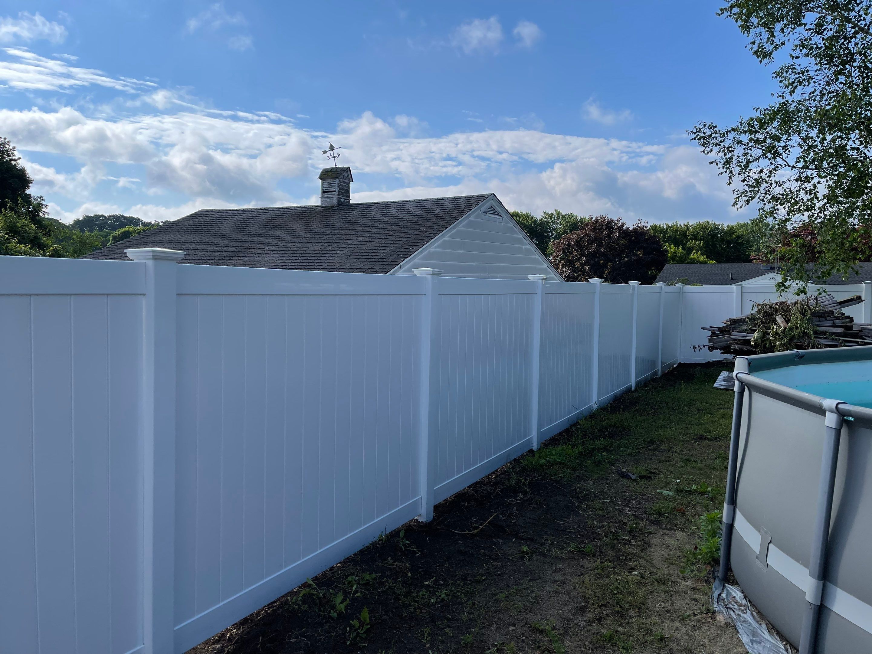 Replacement Vinyl Privacy fence with 3 matching gates in White.  by DiGiorgi Roofing and Siding Inc