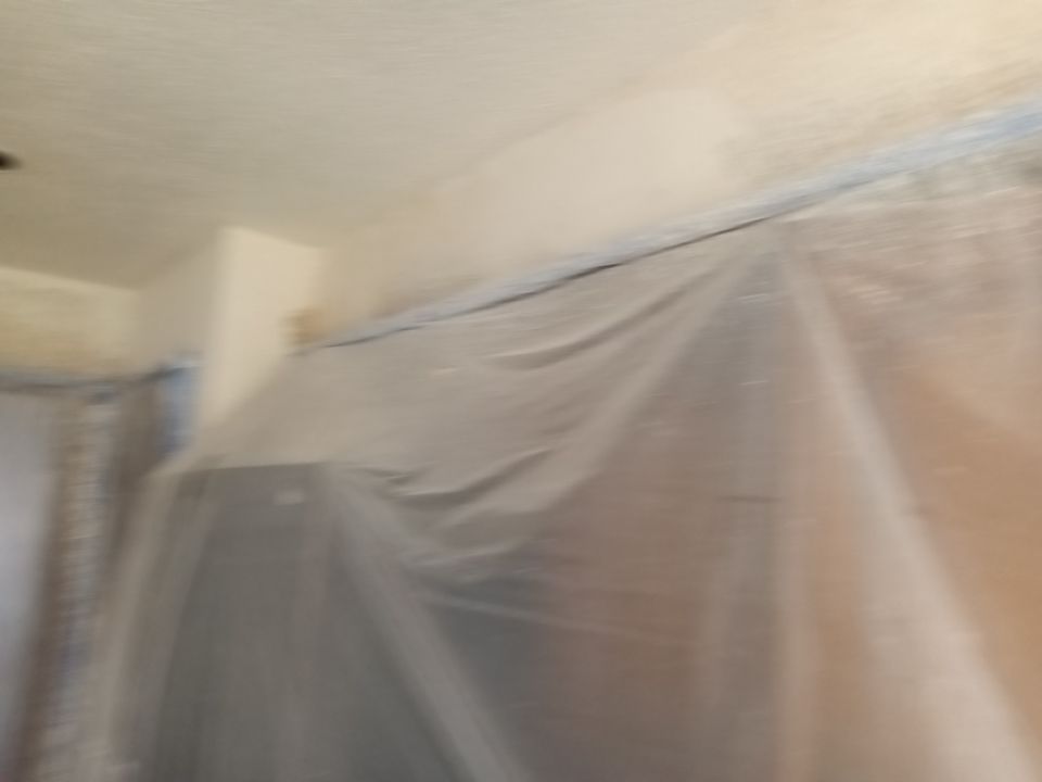 Interior and exterior painting project by Roof Concepts Construction
