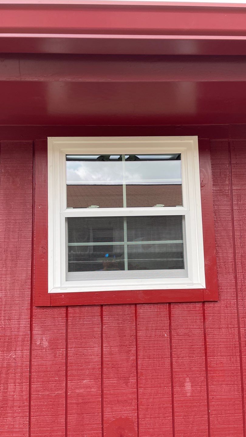 Black and white and red all over by Bayfront Roofing and Construction
