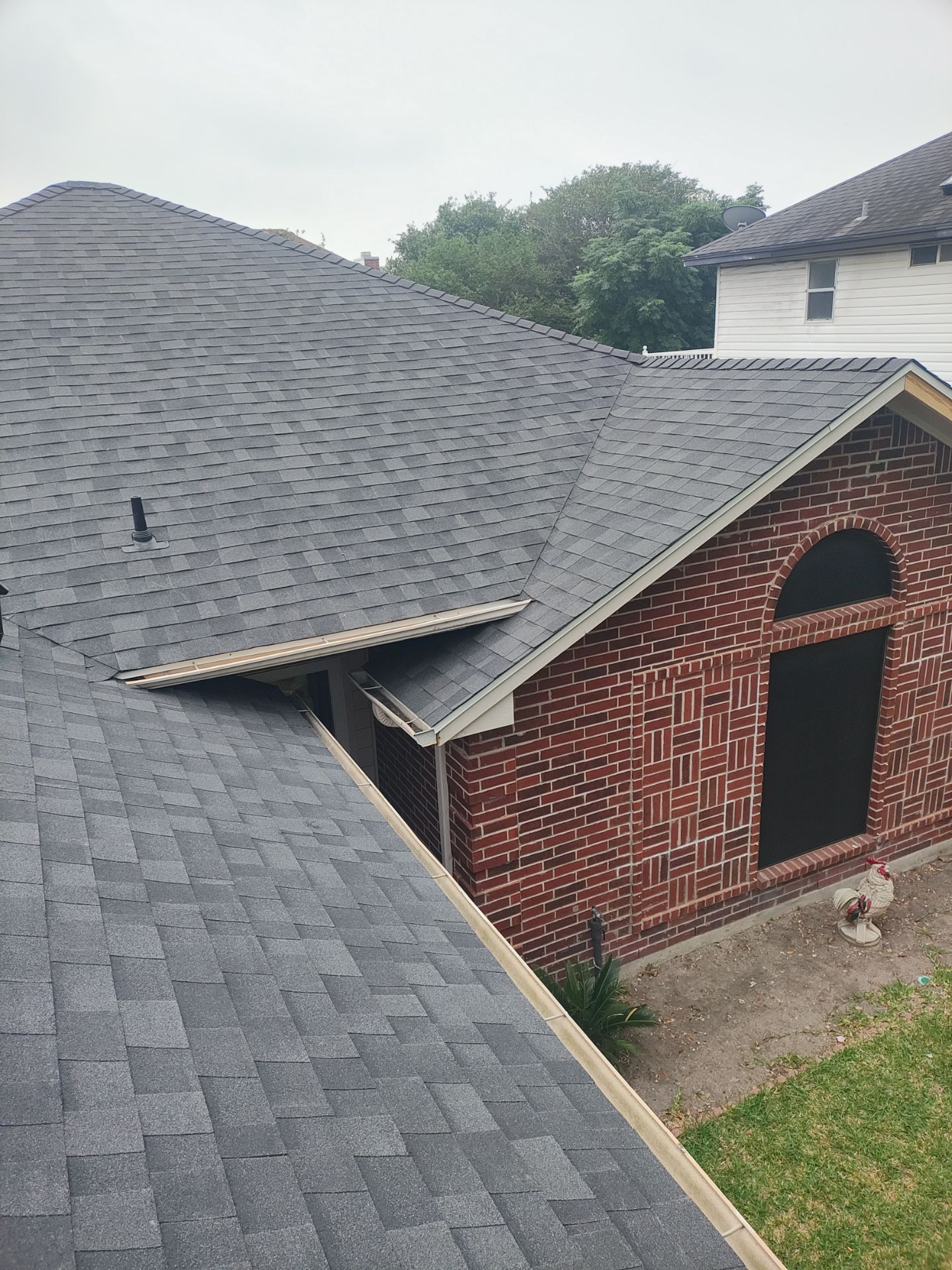 Nothing looks nicer than a little black roof by Bayfront Roofing and Construction