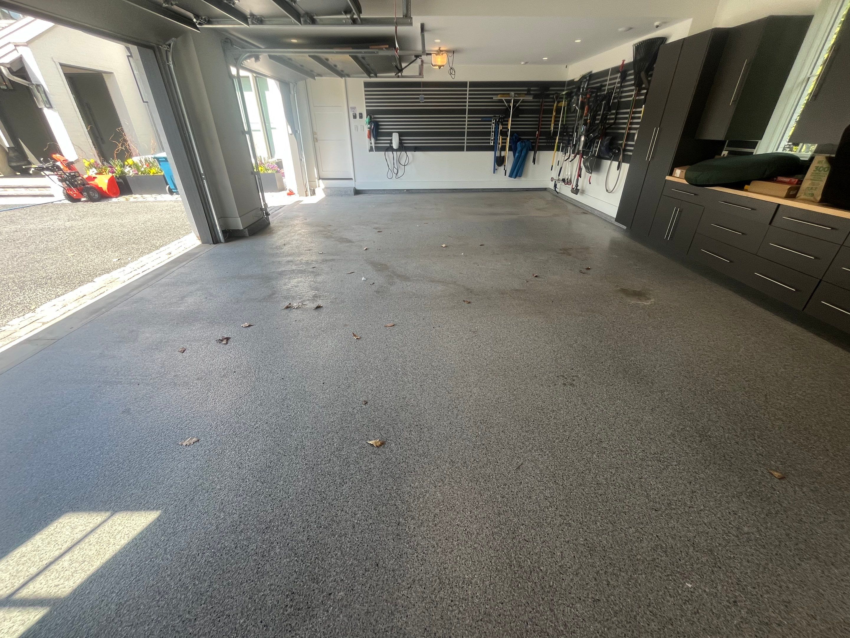 Exterior Stone and Garage Pressure Washing by Northern Power Washing LLC.