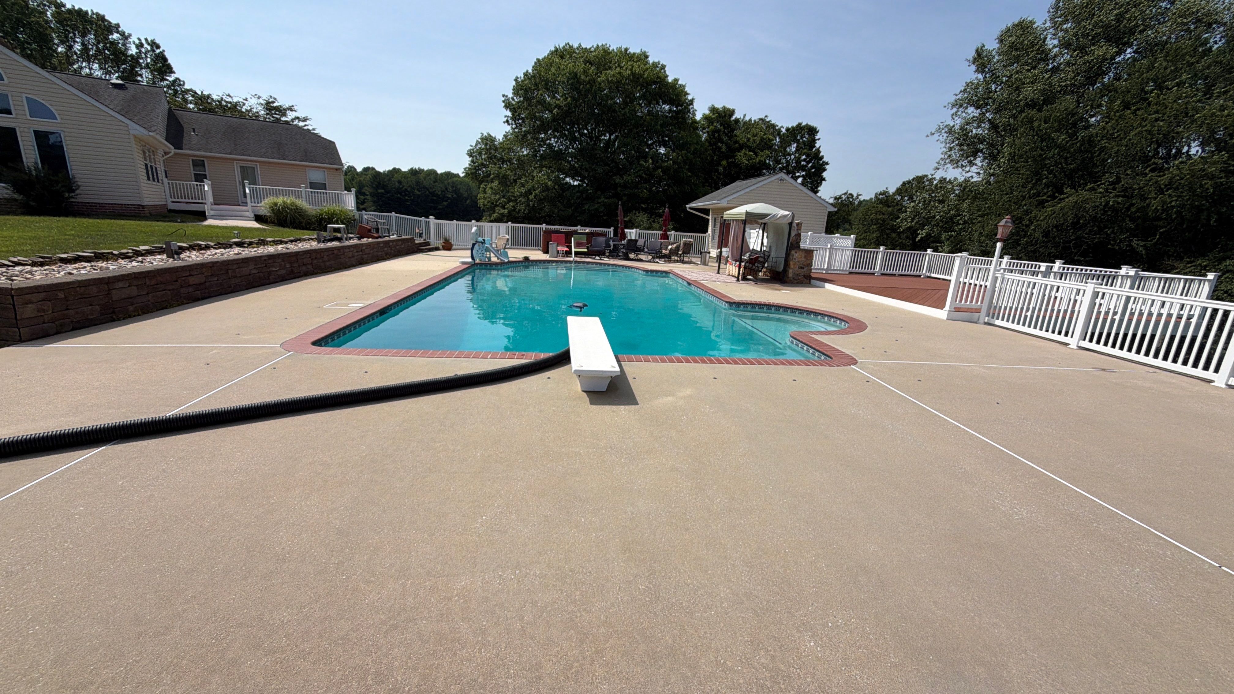 Concrete Pool Deck and Multi-Bay Building Cleaning in Eldersburg by Baltimore Pressure Washers Inc.