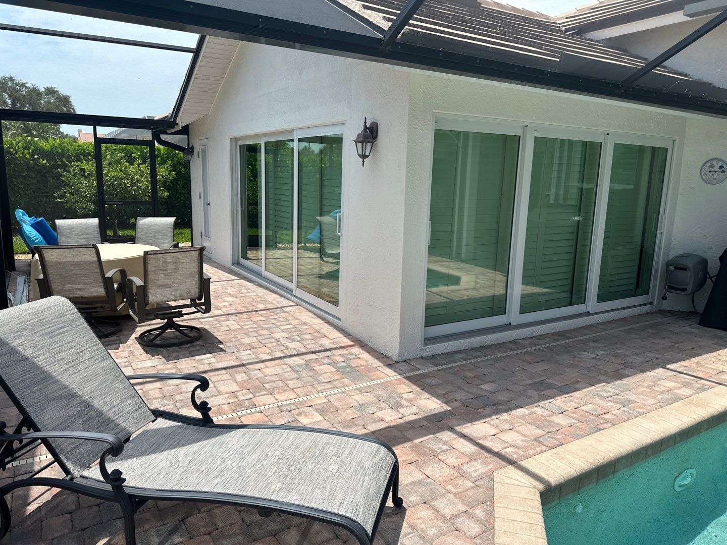 Window Installation using PGT Aluminum for the doors and PGT Vinyl for the Windows  by Windows For Life 