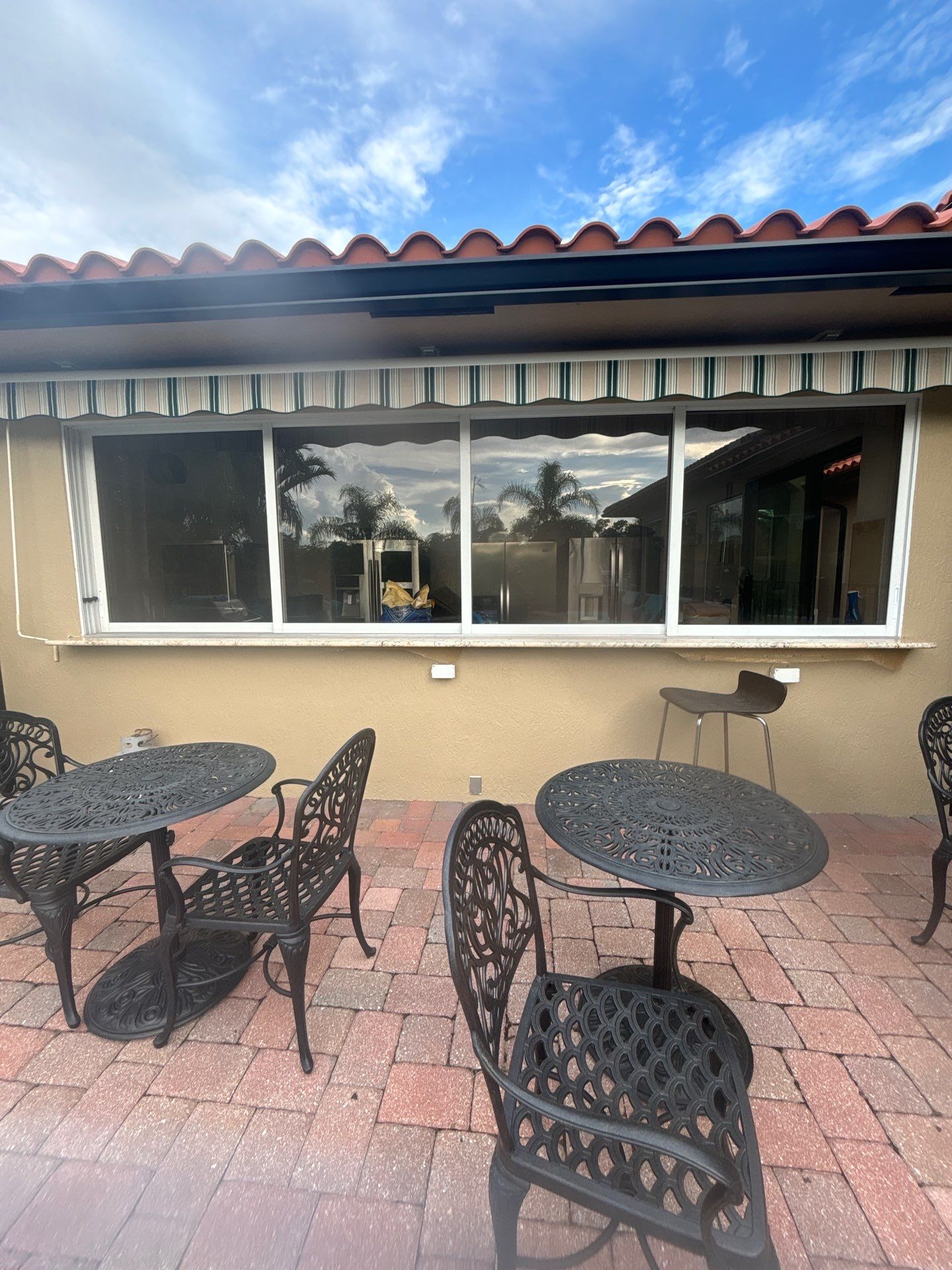 PGT Black pocket doors and Euro-Wall storefront & SGD by Windows For Life 