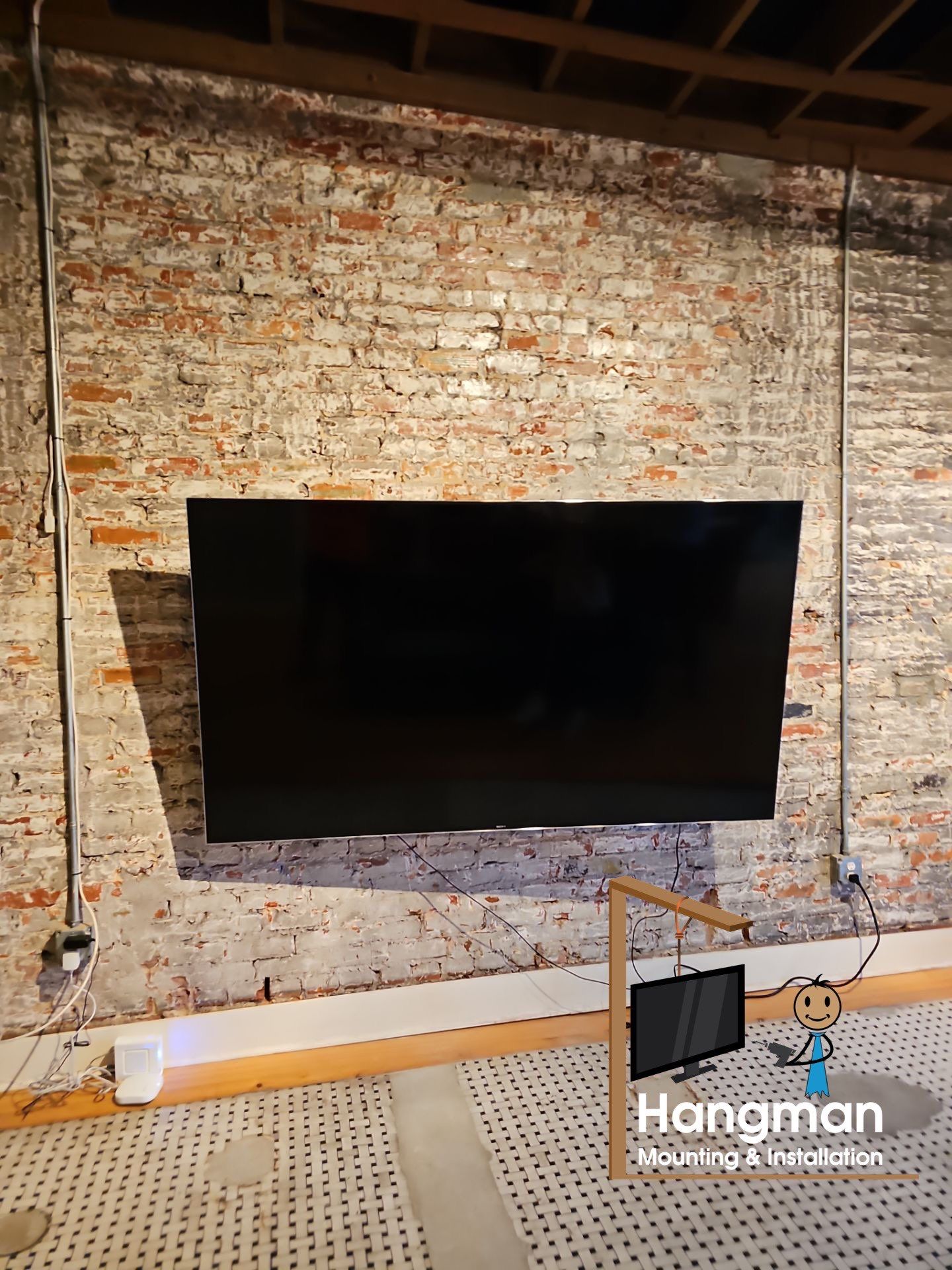 Custom TV Mounting & Specialty Installations by Hangman Mounting & Installation