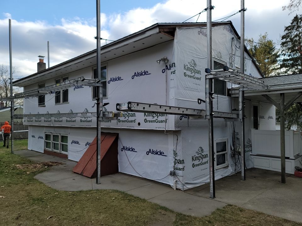 Siding Installation using Everlast Composite Siding by UBrothers Construction