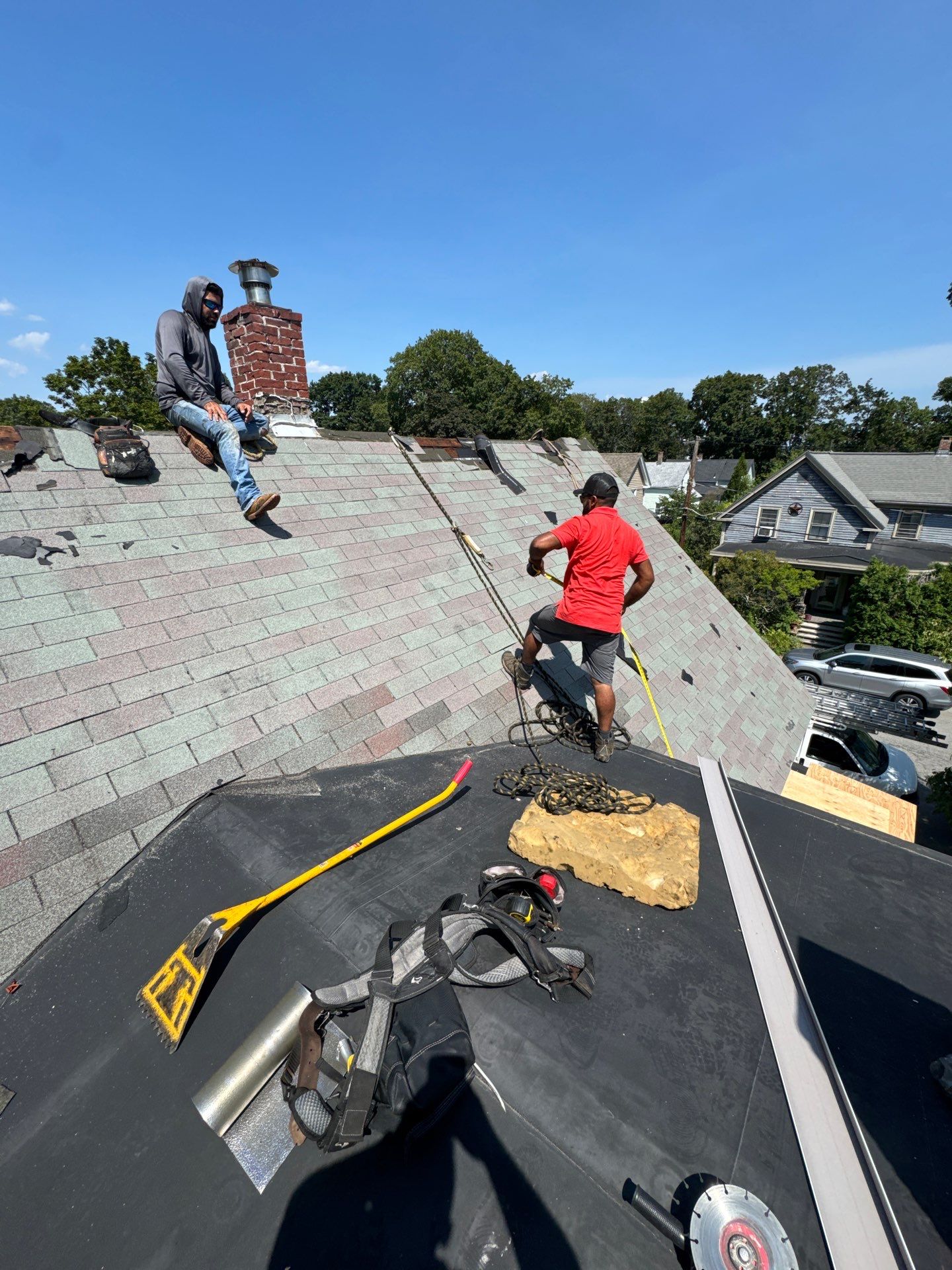 Full Roof Replacement + Custom Gutter Install | Onyx Black Finish by Mighty Dog Roofing of Greater Middlesex County