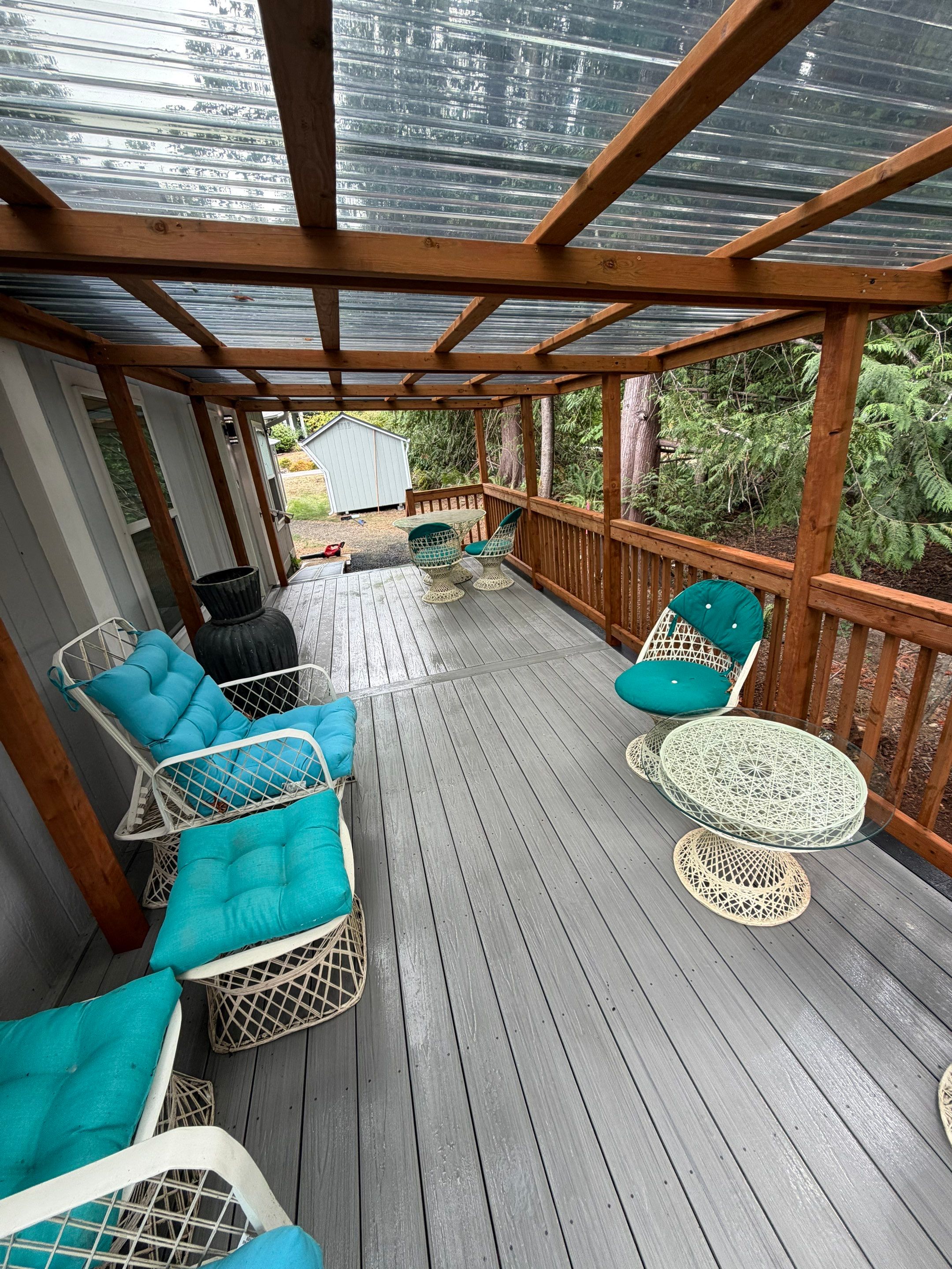 Covered Composite Deck with Translucent Pergola Roof in Port Orchard by Expedeck