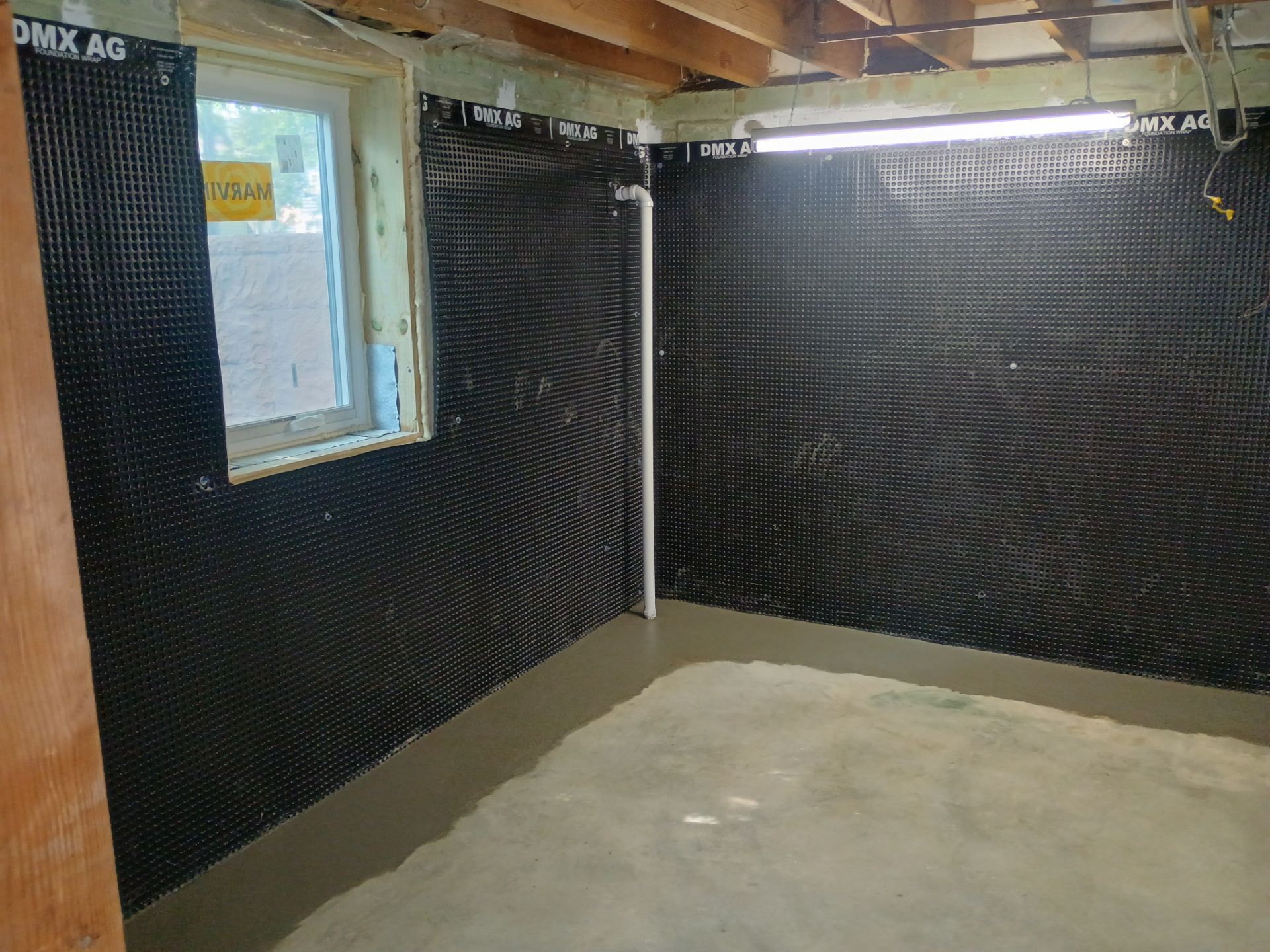 Interior Drain Tile & Wall Drainage in Southwest Minneapolis by Waterproofing Northeast