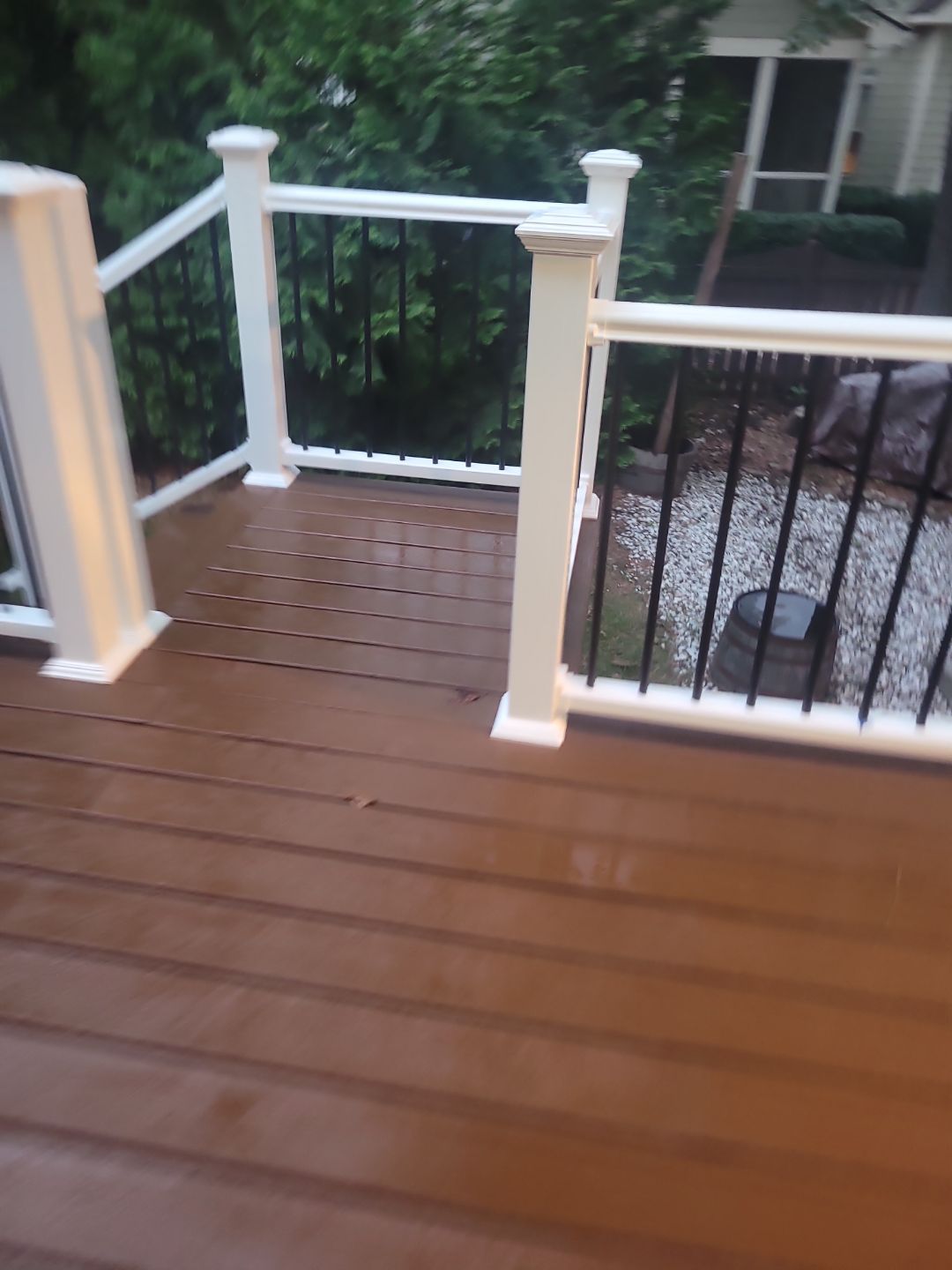 Fuquay-Varina Outdoor Upgrade – Composite Deck & Paved Landing by Elite Remodeling and Design LLC