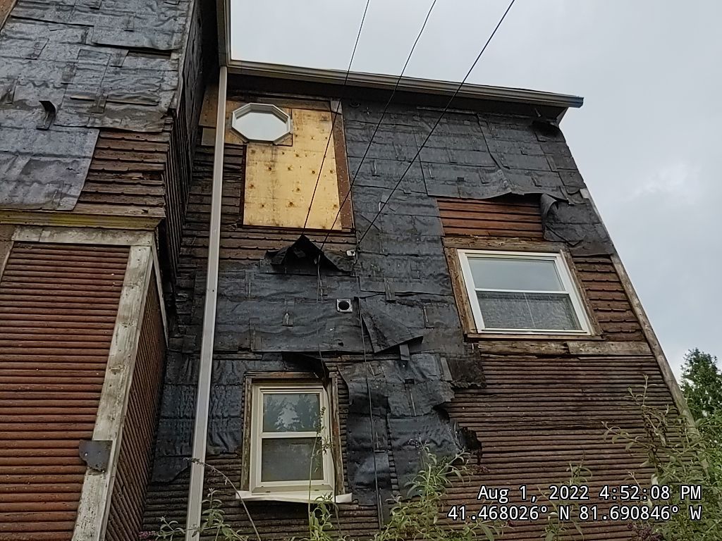 Fire damaged home in Tremont by Absolute Roofing and Construction