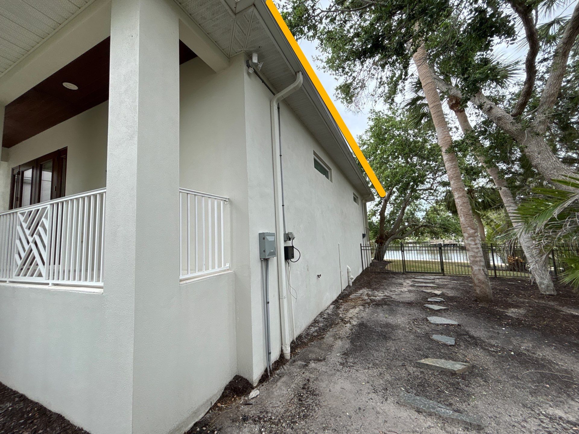 6-Inch White Seamless Gutters Installation in Siesta Key FL by Gutter Professors