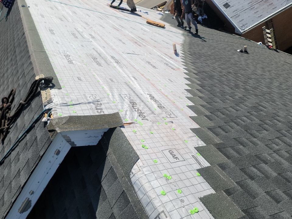 Residential Roofing Installation using Roof Replacement by American Roofing & Construction LLC