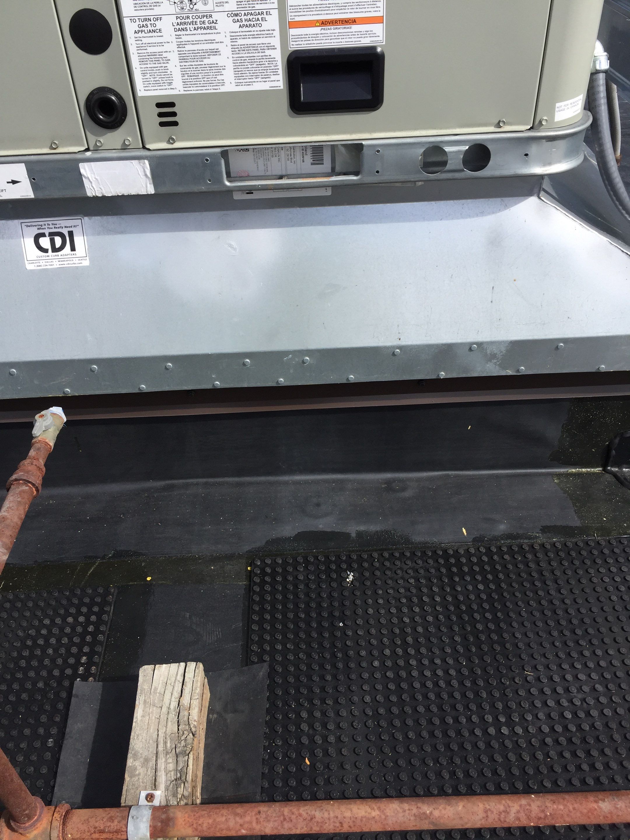 Commercial Rubber Roofing  using Carlisle Rubber Roofing System by Secure Construction Company Inc