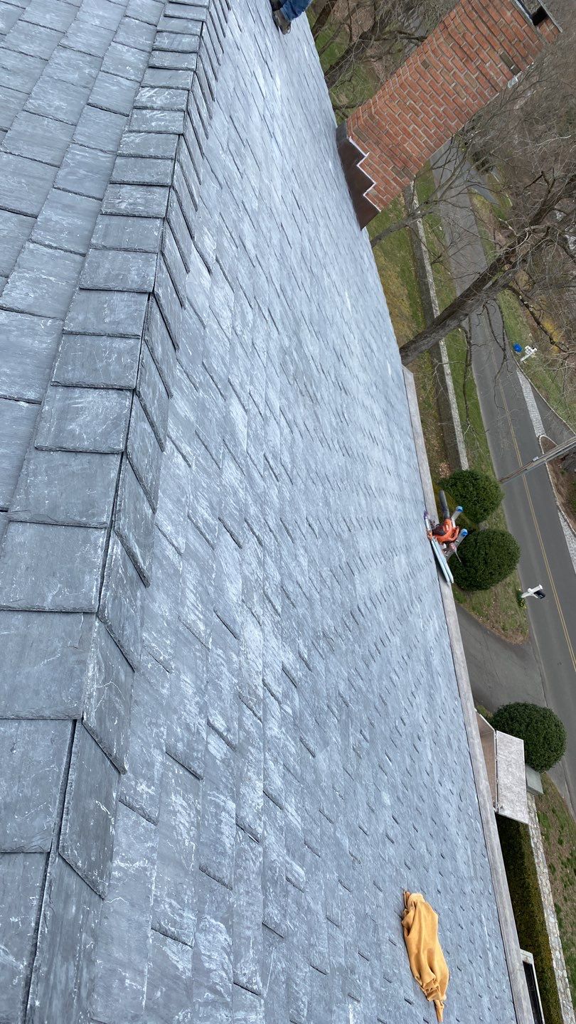 Residential Roofing Installation using Vermont Slate by A Plus Exterior