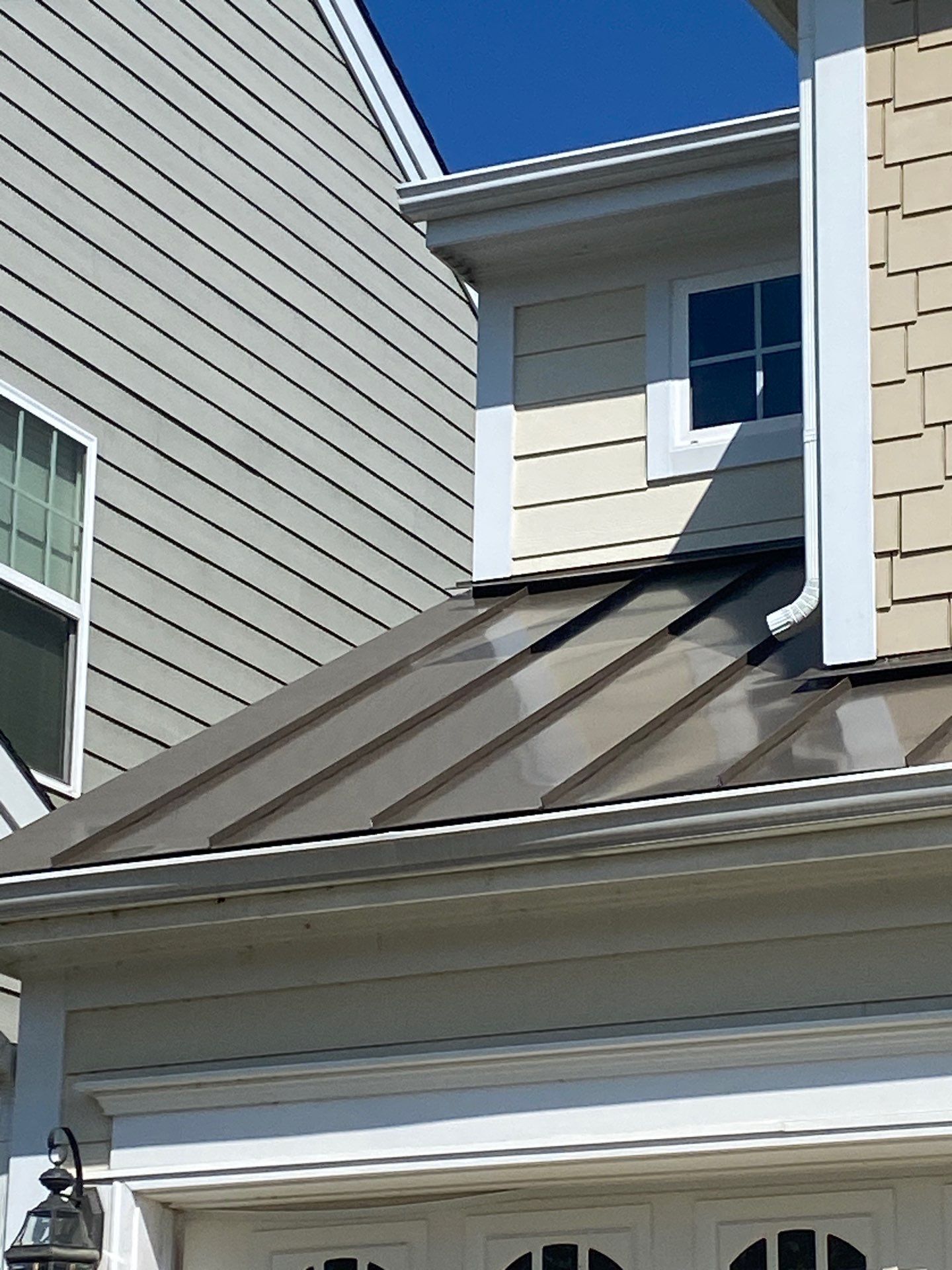 GAF Timberline HDZ Weathered Wood - New standing seam metal roof by Pro Performance Roofing